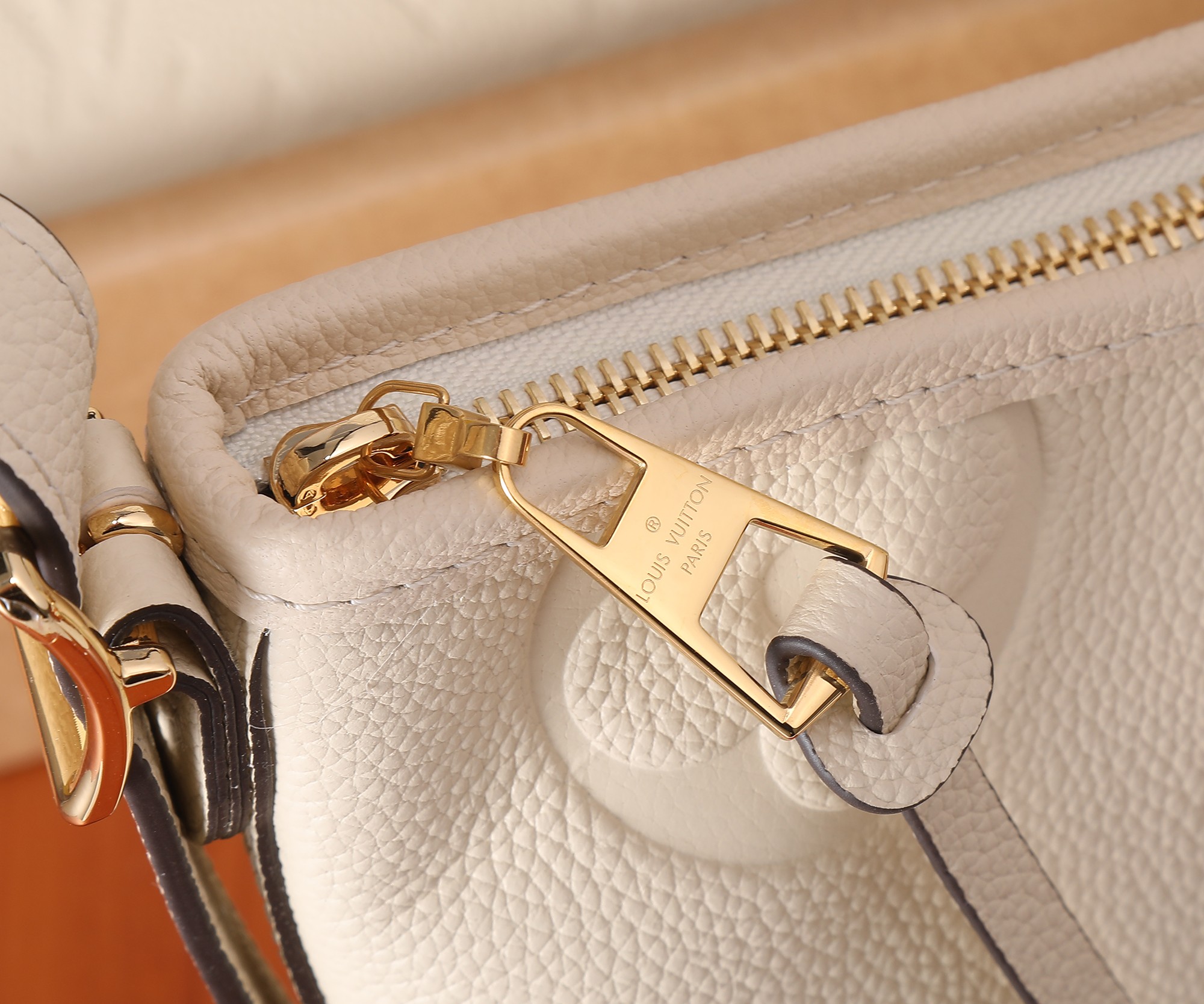 Carryall Pm Bag Monogram Empreinte Leather Cream M46288