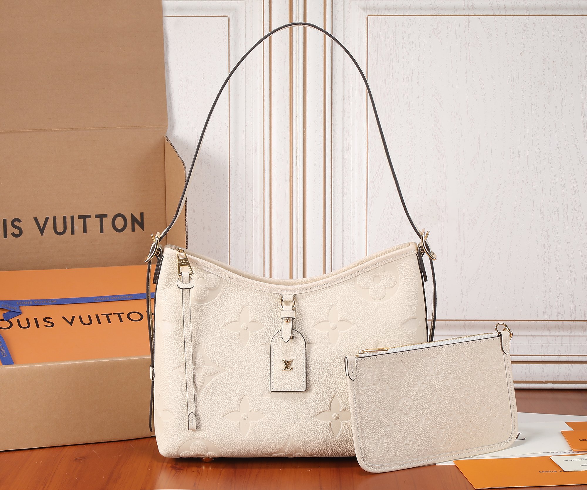 Carryall Pm Bag Monogram Empreinte Leather Cream M46288