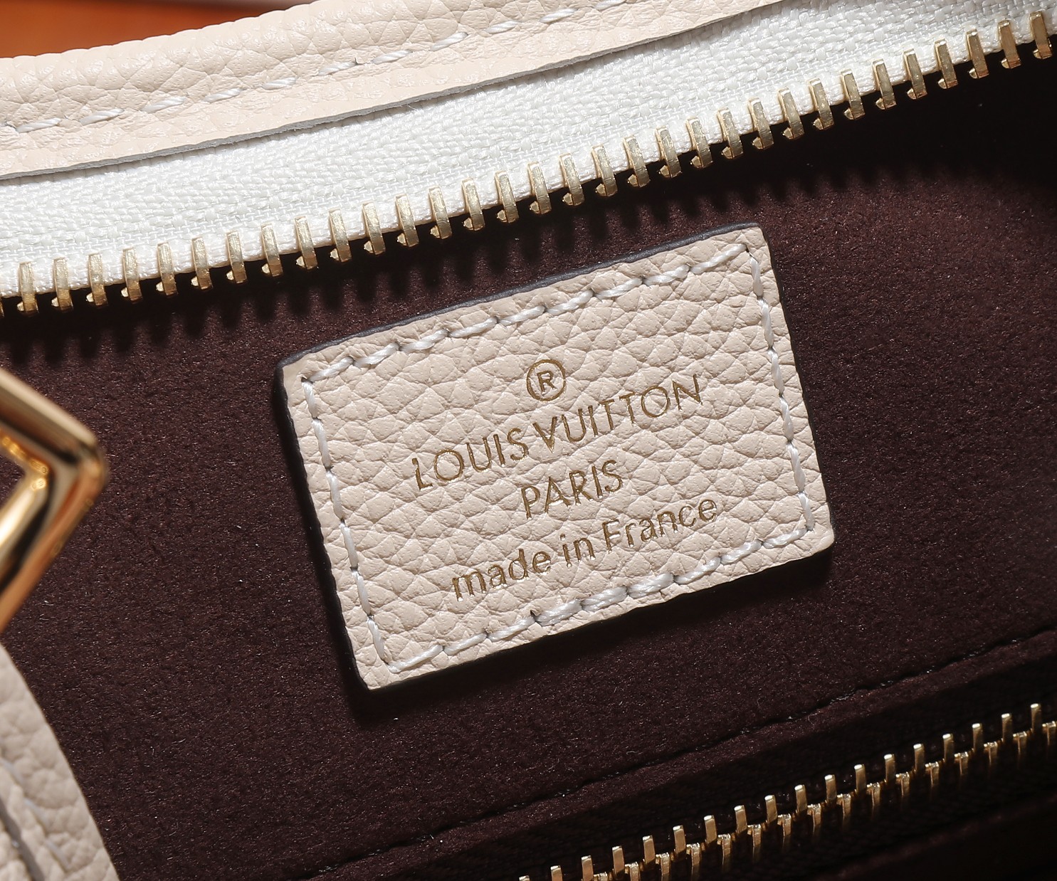 Carryall Pm Bag Monogram Empreinte Leather Cream M46288
