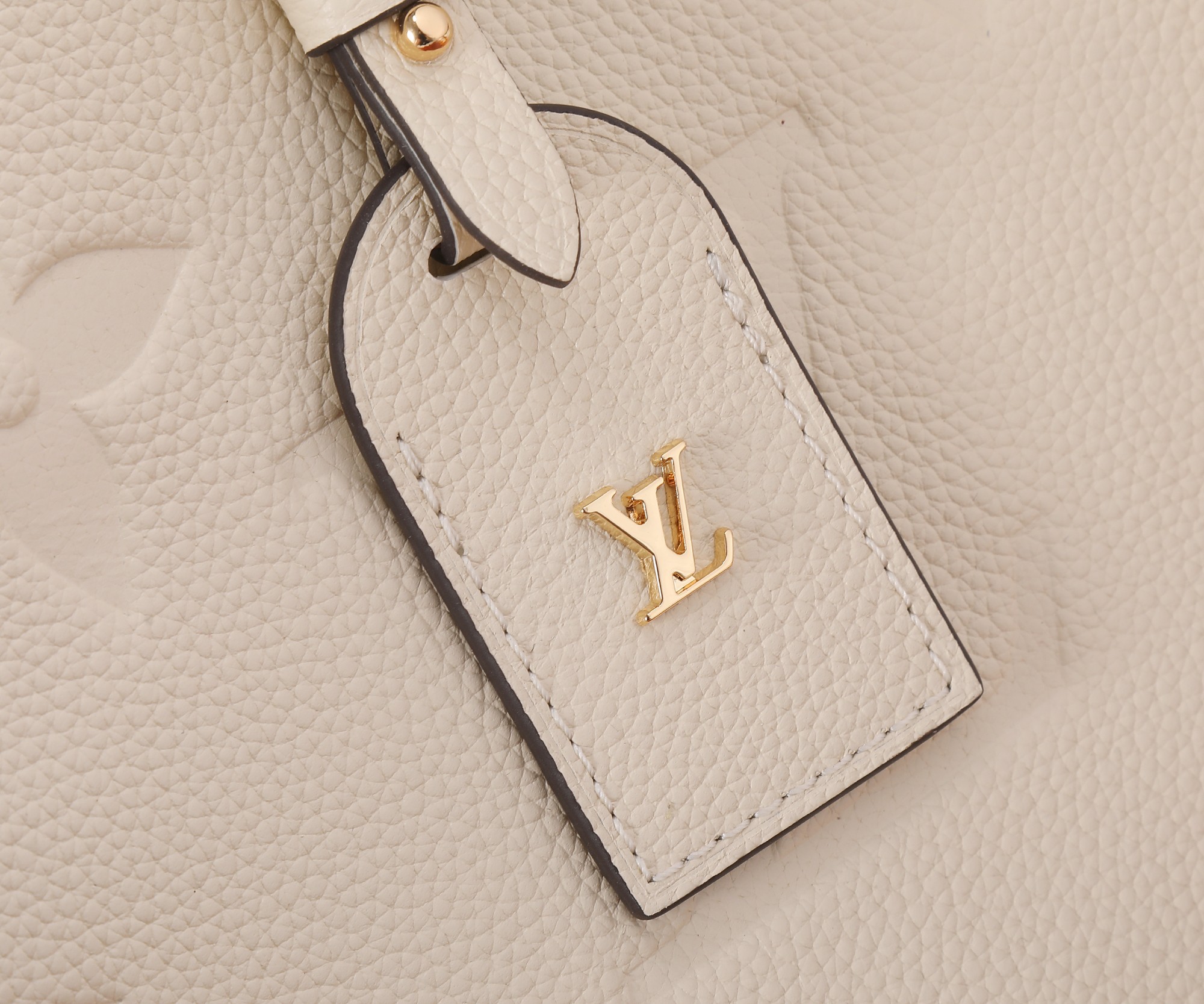 Carryall Pm Bag Monogram Empreinte Leather Cream M46288