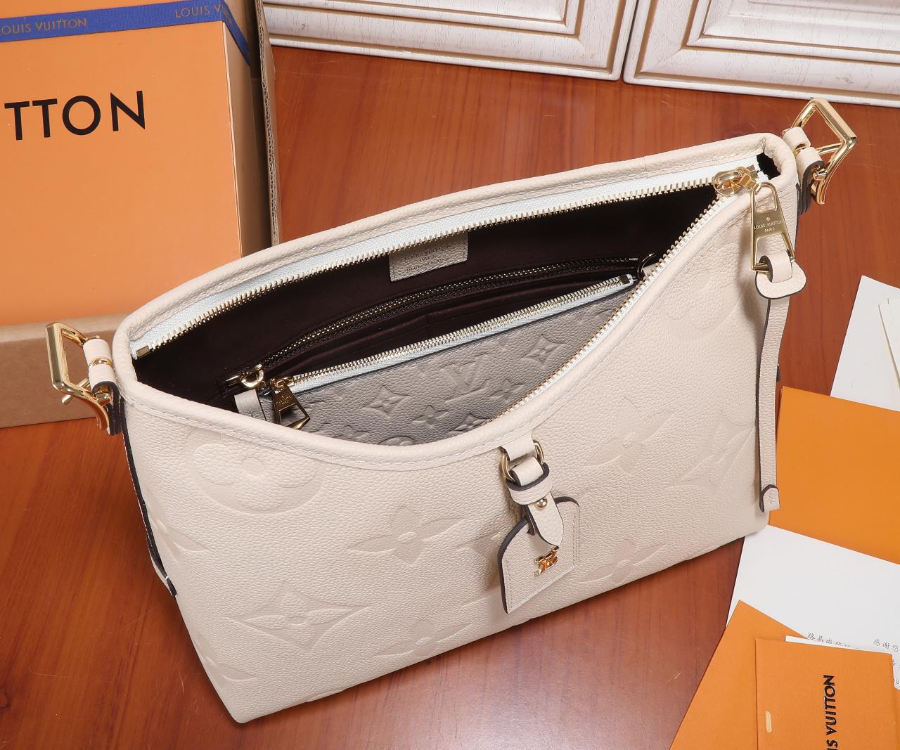 Carryall Pm Bag Monogram Empreinte Leather Cream M46288
