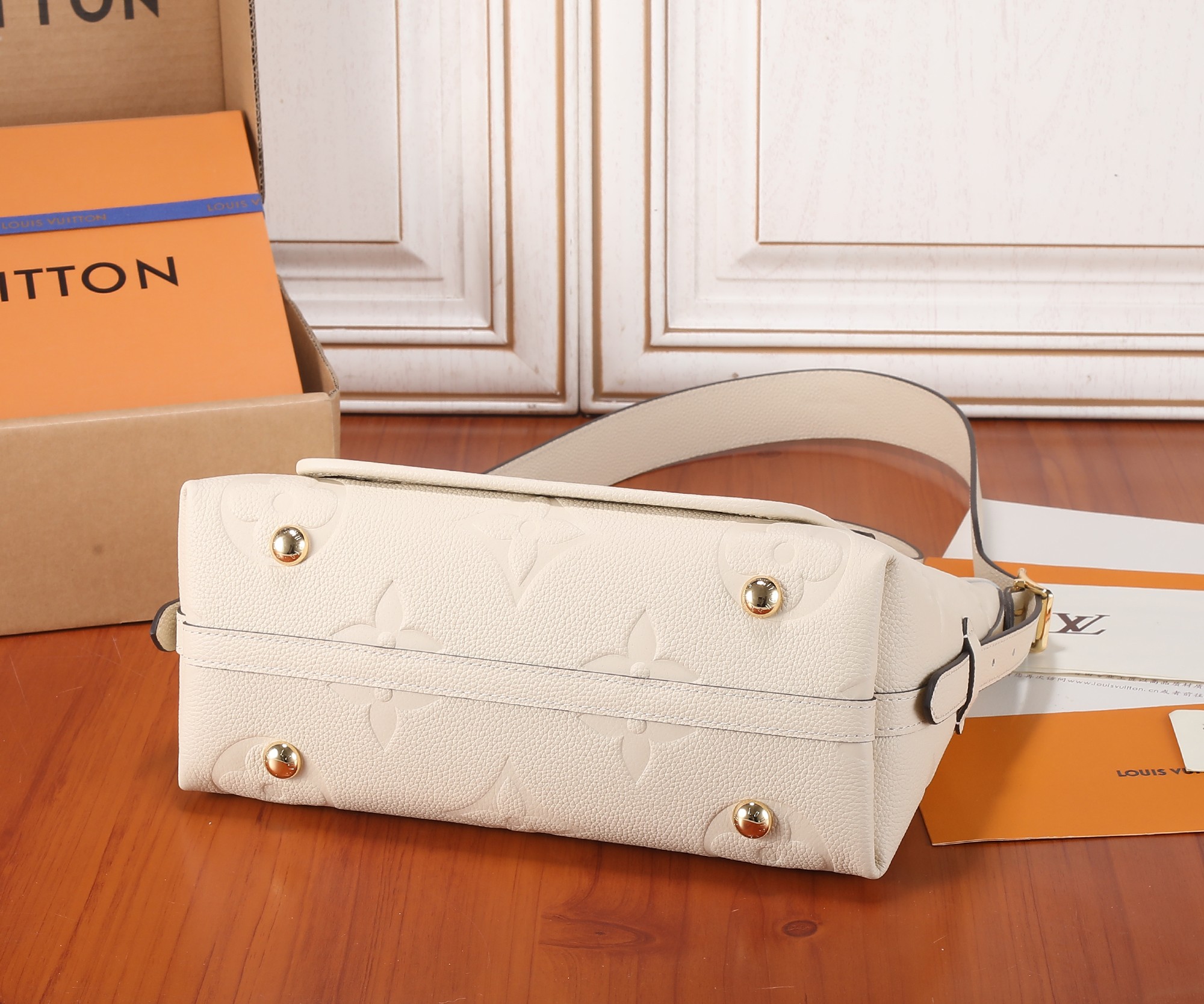 Carryall Pm Bag Monogram Empreinte Leather Cream M46288