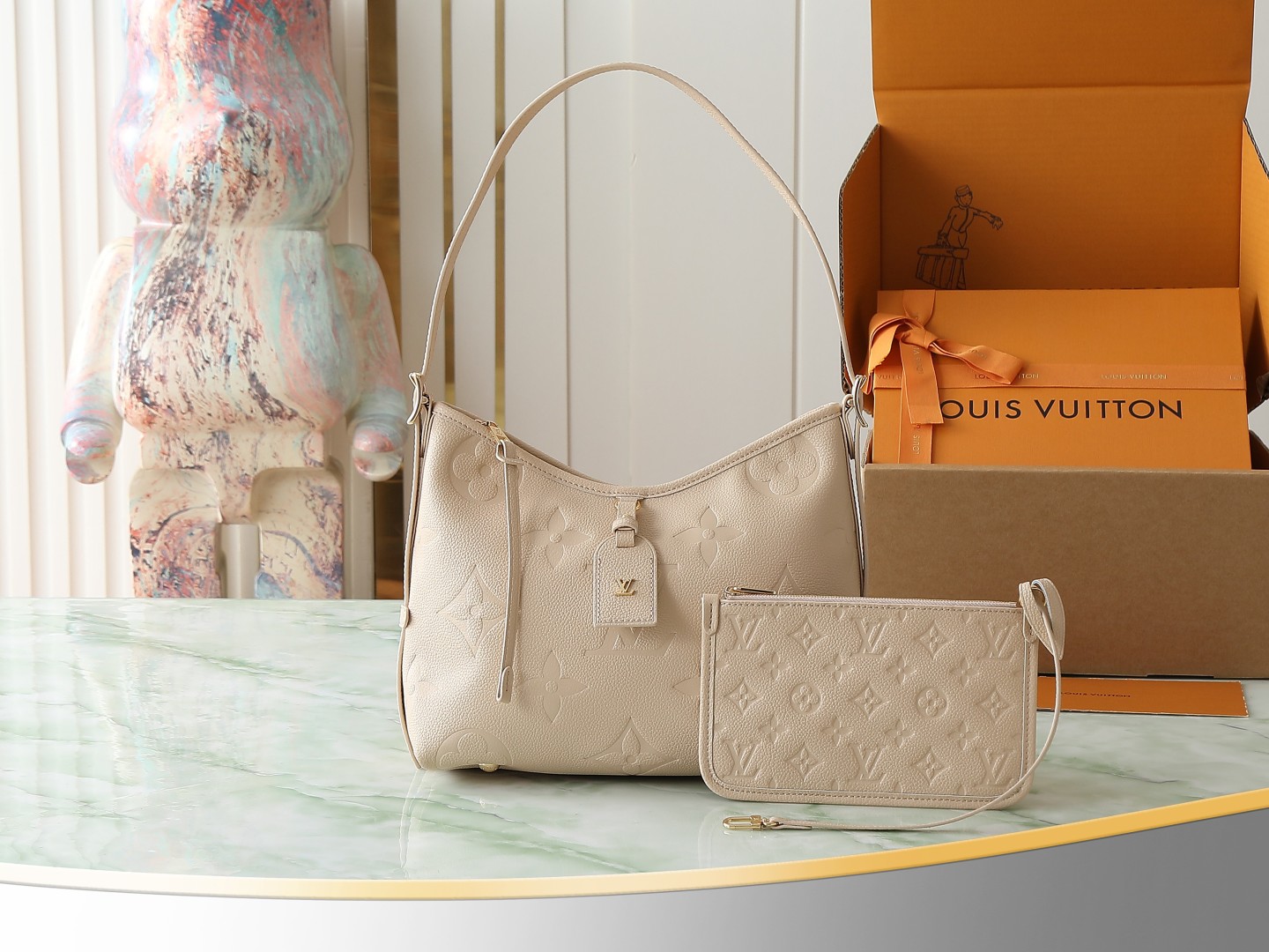 Carryall Pm Bag Monogram Empreinte Leather Sand M14321