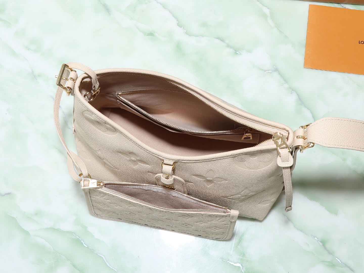 Carryall Pm Bag Monogram Empreinte Leather Sand M14321