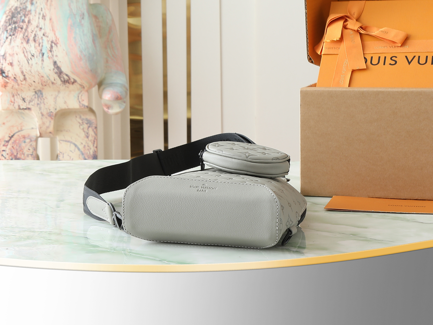 Duo Slingbag Monogram Shadow Sand M12486