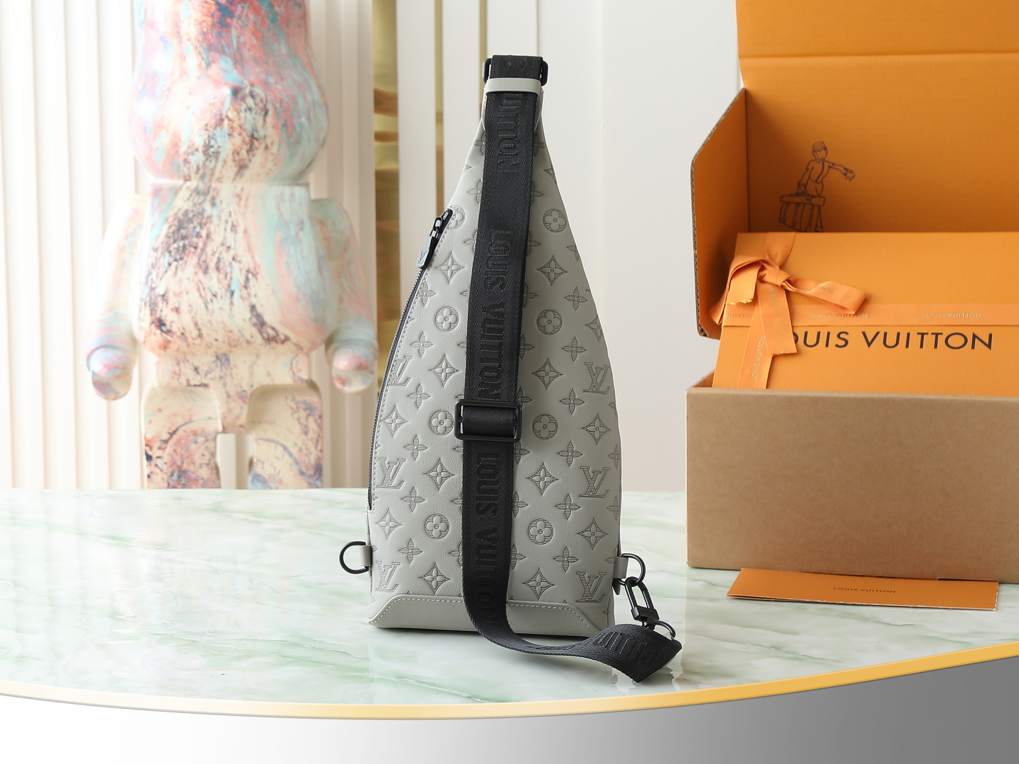 Duo Slingbag Monogram Shadow Sand M12486