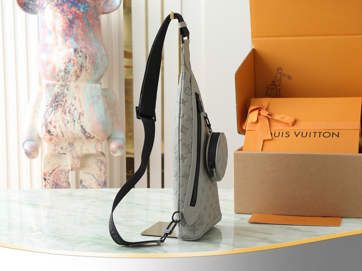 Duo Slingbag Monogram Shadow Sand M12486