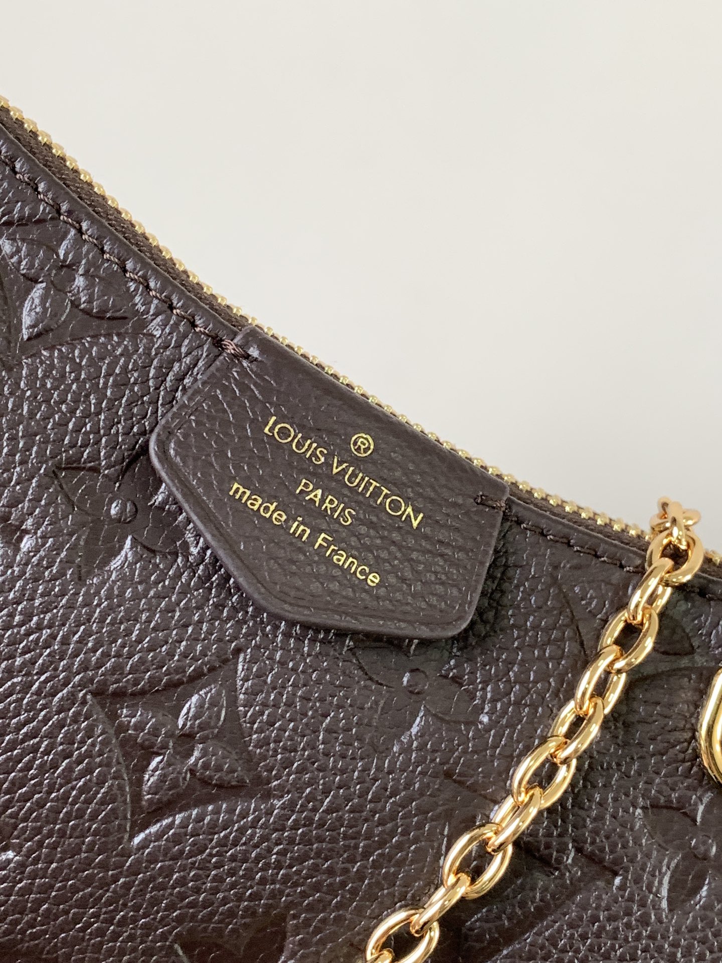Easy Pouch On Strap Chocolate Embossed Monogram Empreinte Cowhide Leather M13614