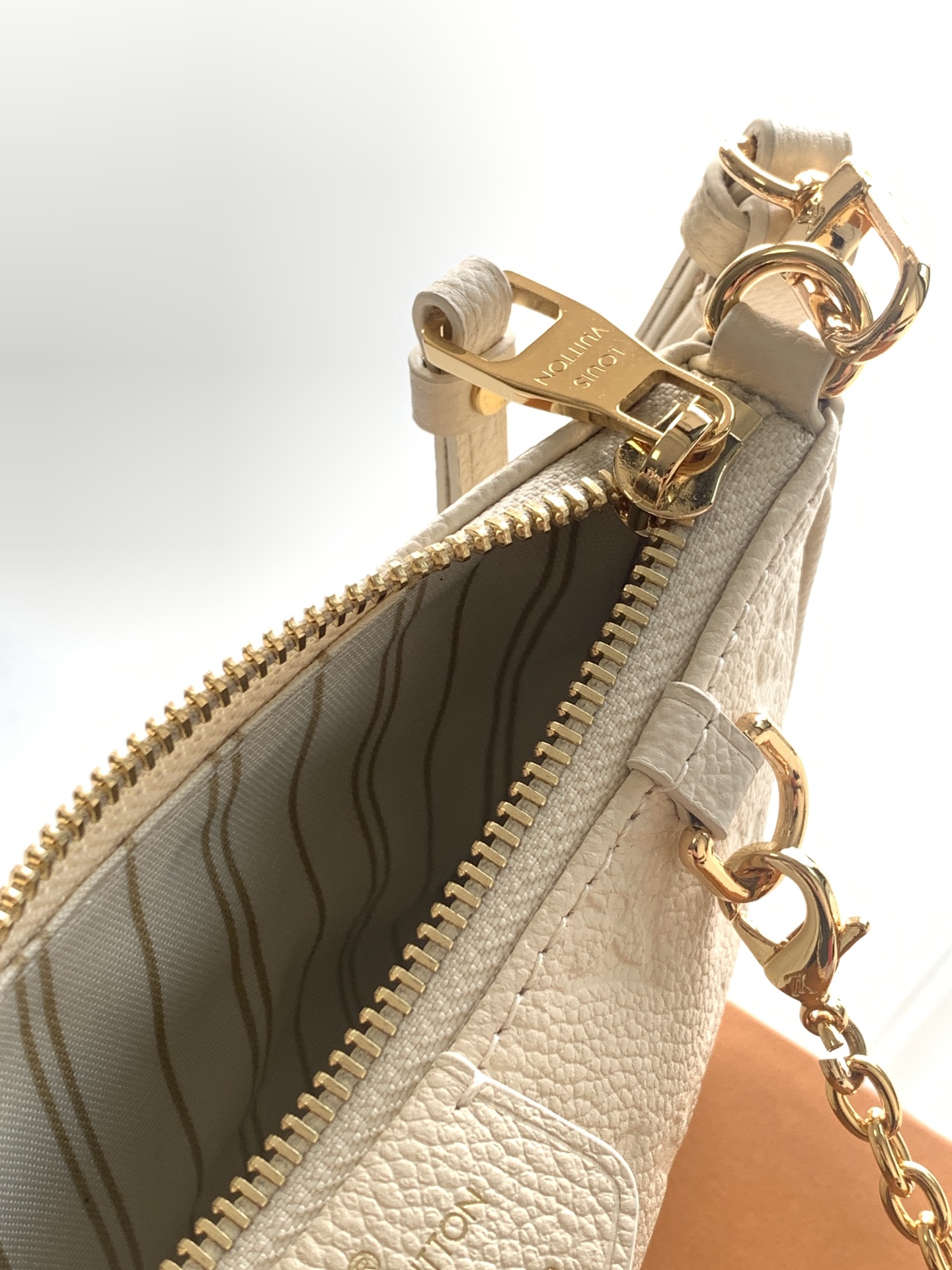 Easy Pouch On Strap Cream Embossed Monogram Empreinte Cowhide Leather M81066