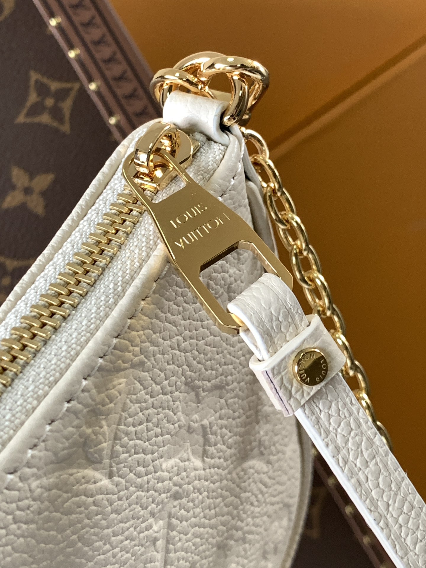Easy Pouch On Strap Cream Embossed Monogram Empreinte Cowhide Leather M81066