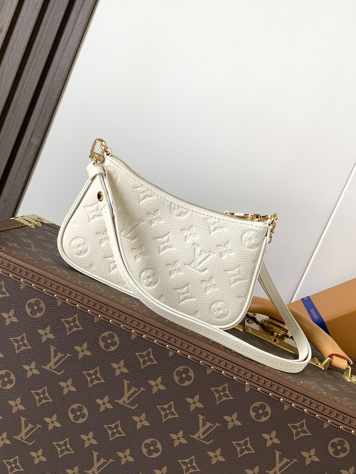 Easy Pouch On Strap Cream Embossed Monogram Empreinte Cowhide Leather M81066