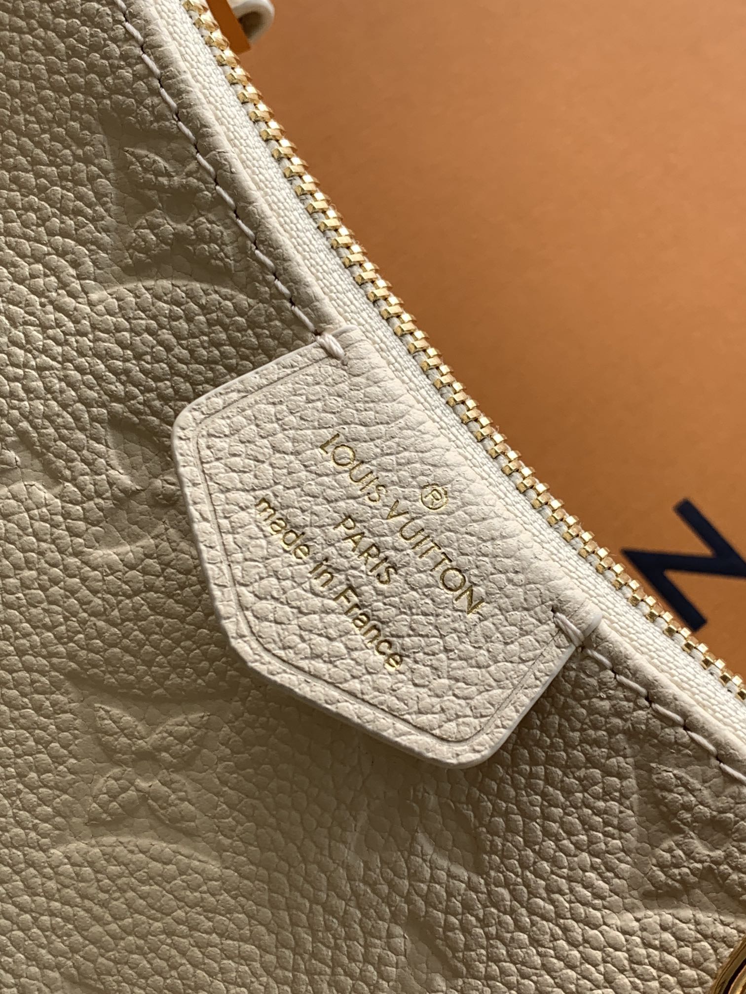 Easy Pouch On Strap Cream Embossed Monogram Empreinte Cowhide Leather M81066