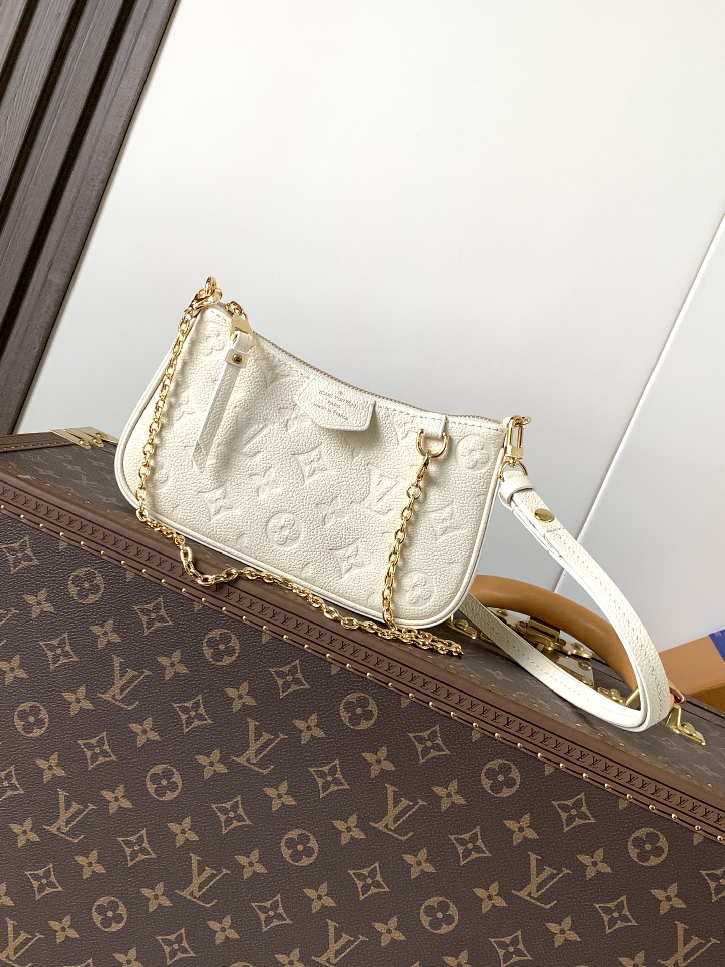 Easy Pouch On Strap Cream Embossed Monogram Empreinte Cowhide Leather M81066