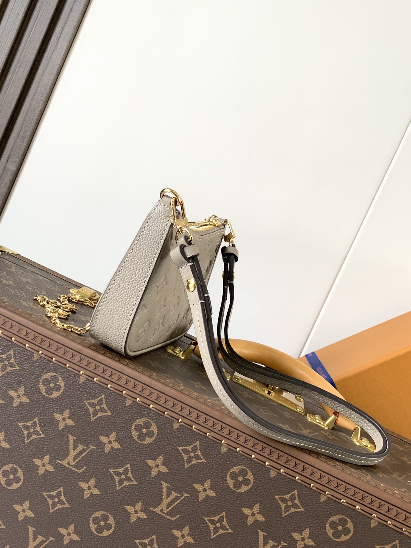 Easy Pouch On Strap Turtledove Embossed Monogram Empreinte Cowhide Leather M81862