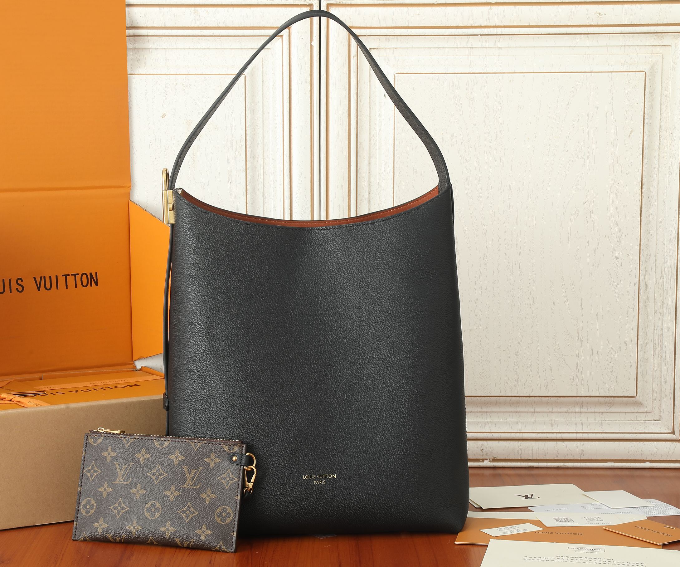 Low Key Hobo Mm Bag Black Grained Calfskin M24856
