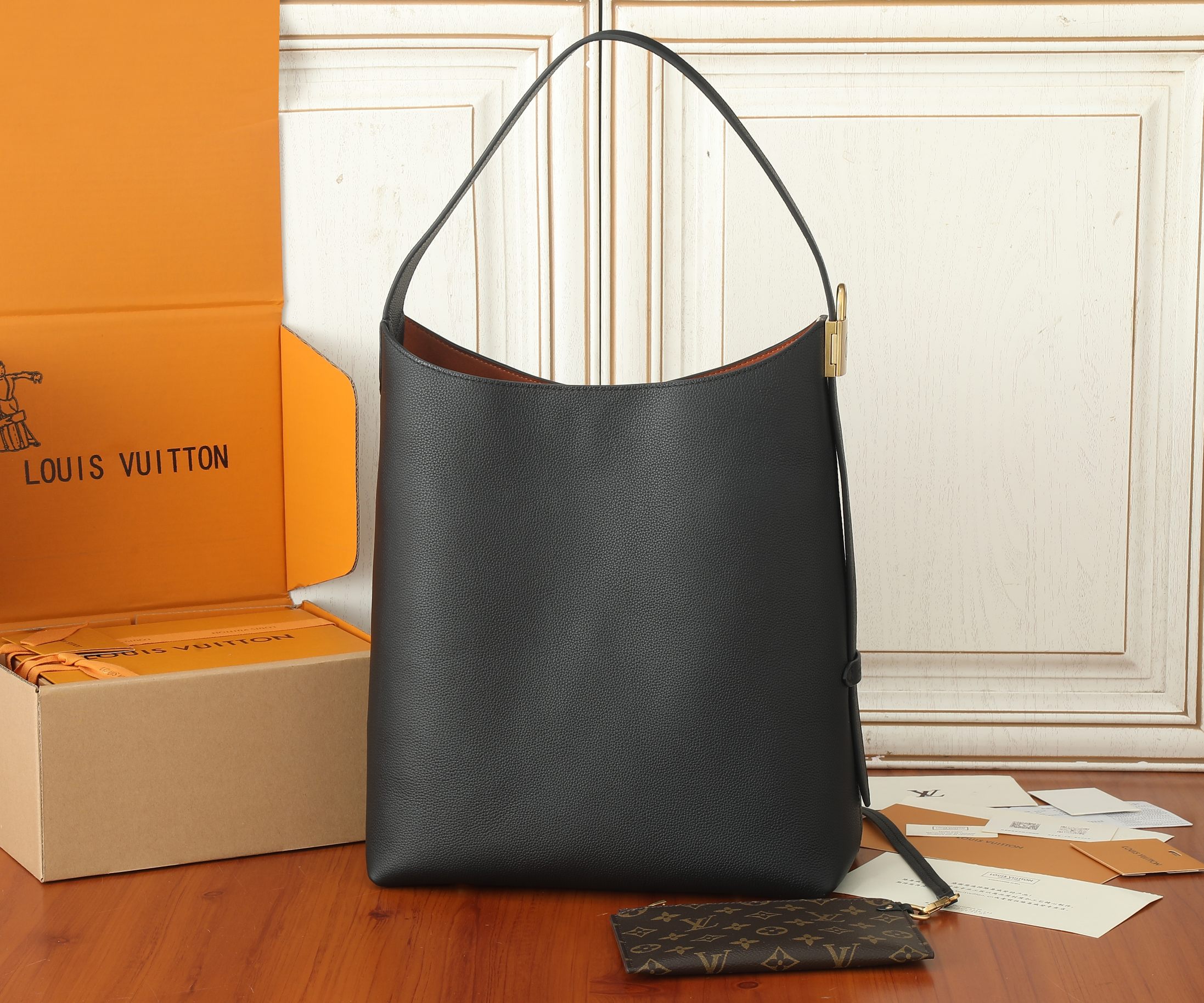Low Key Hobo Mm Bag Black Grained Calfskin M24856