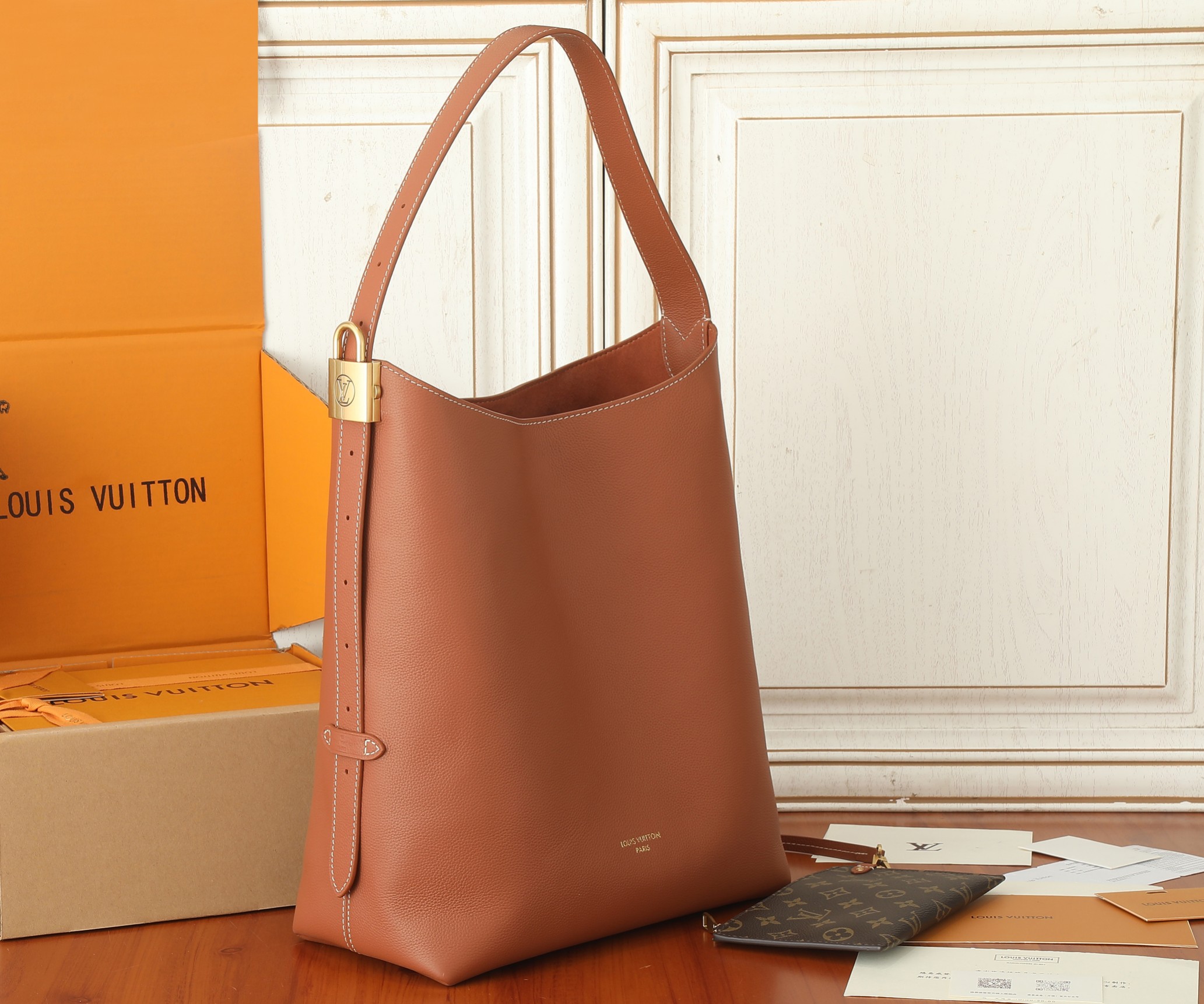 Low Key Hobo Mm Bag Cognac Grained Calfskin M24974