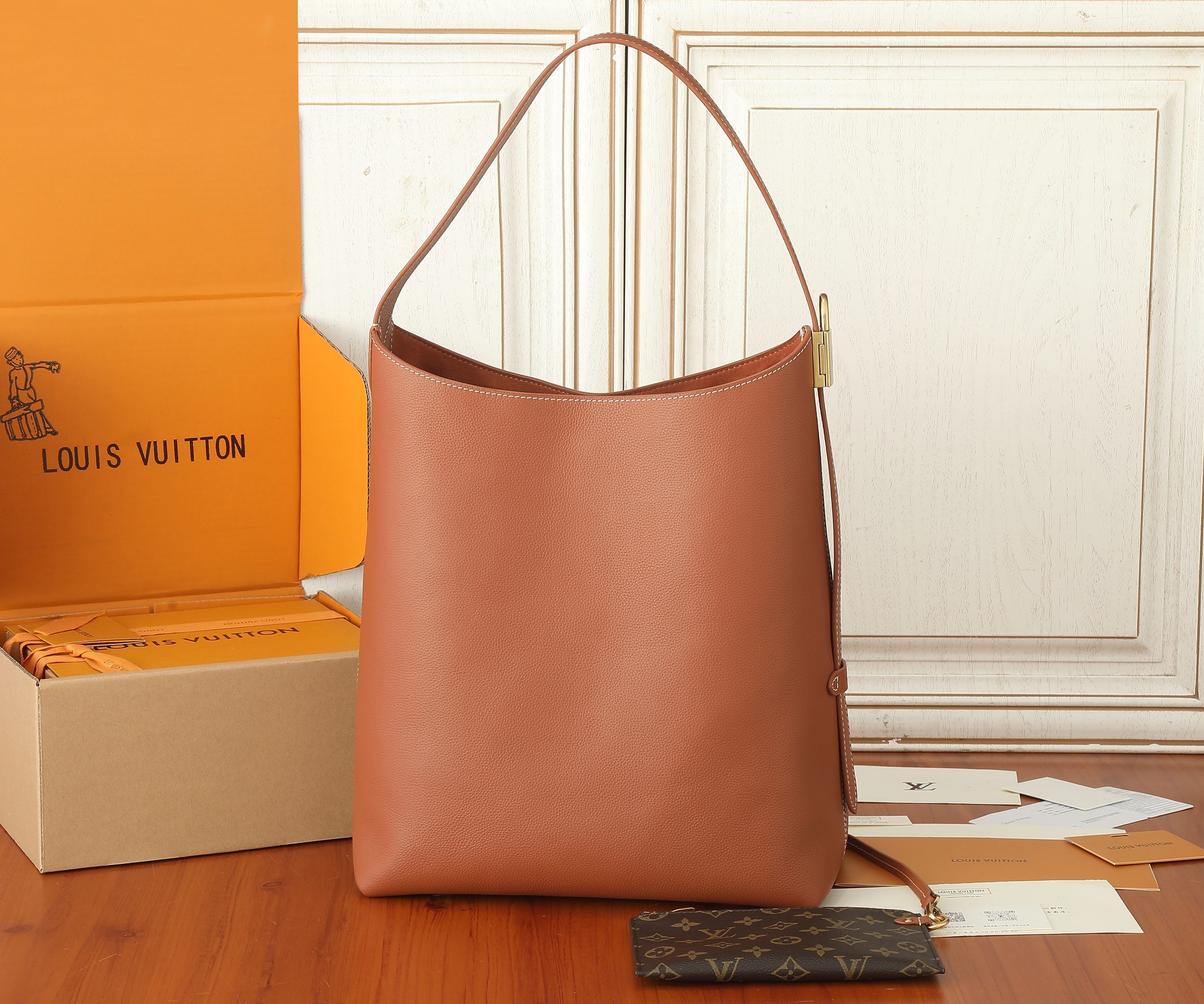 Low Key Hobo Mm Bag Cognac Grained Calfskin M24974