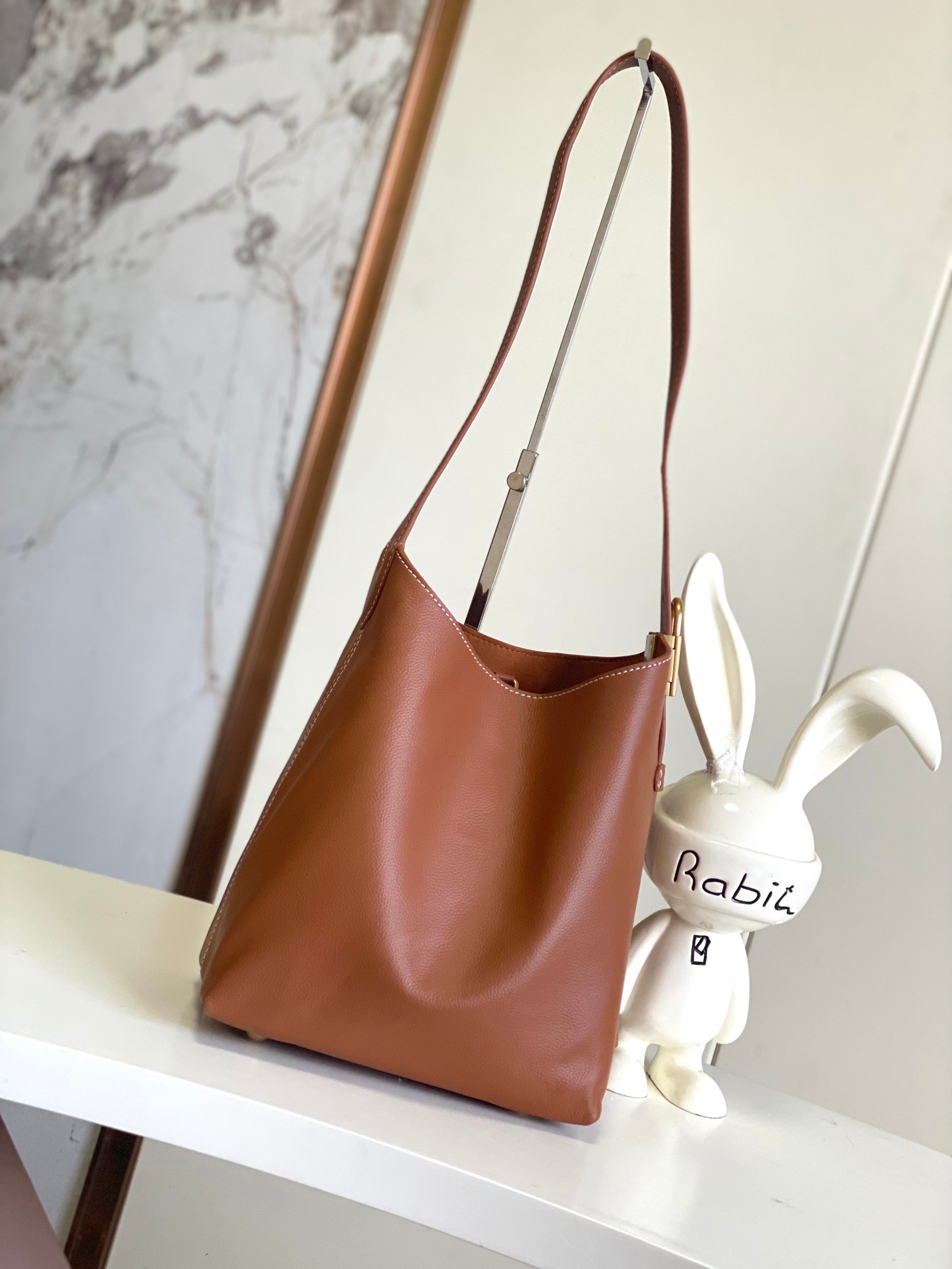 Low Key Hobo Pm Bag Cognac Calfskin M25354