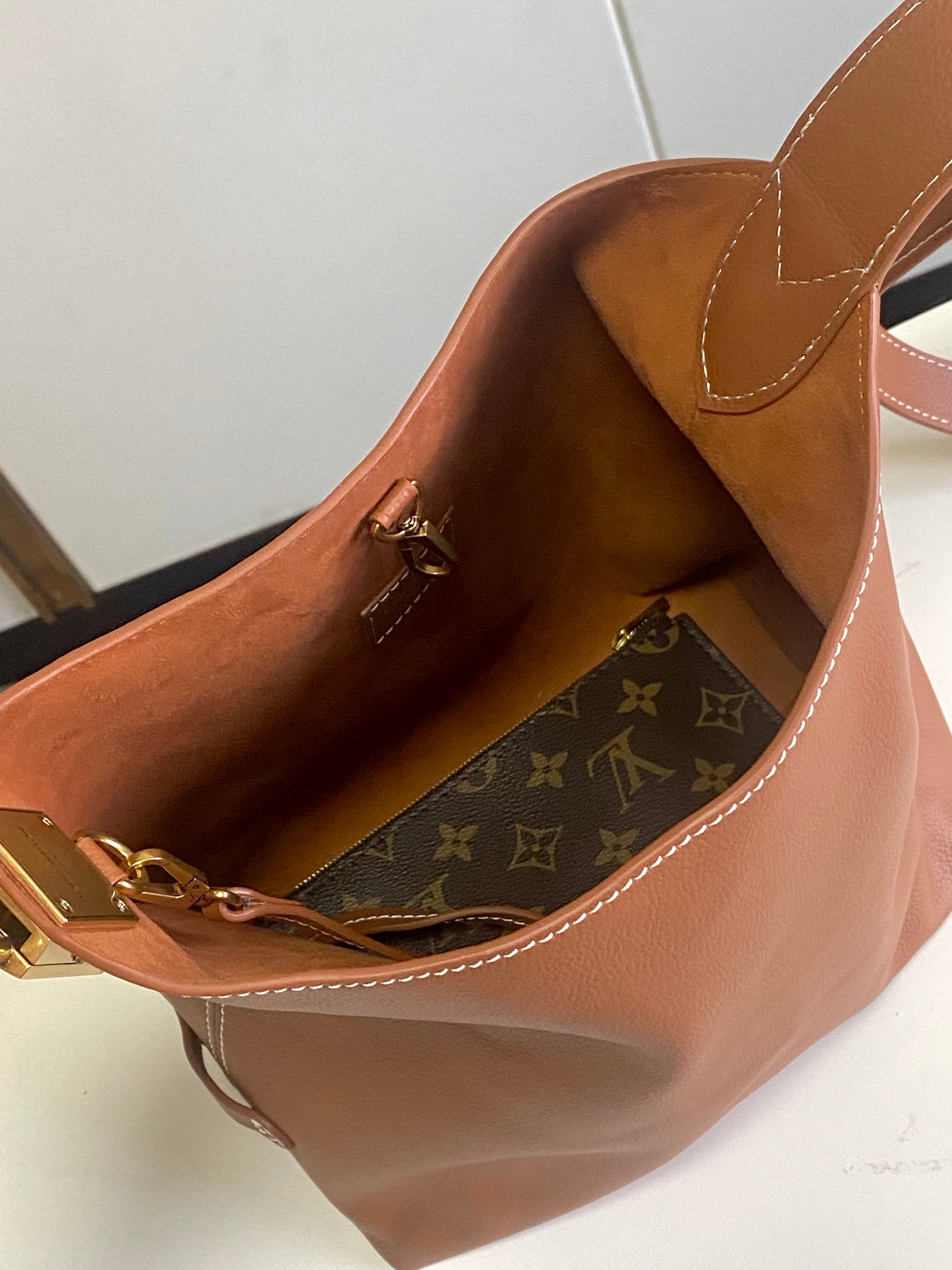 Low Key Hobo Pm Bag Cognac Calfskin M25354