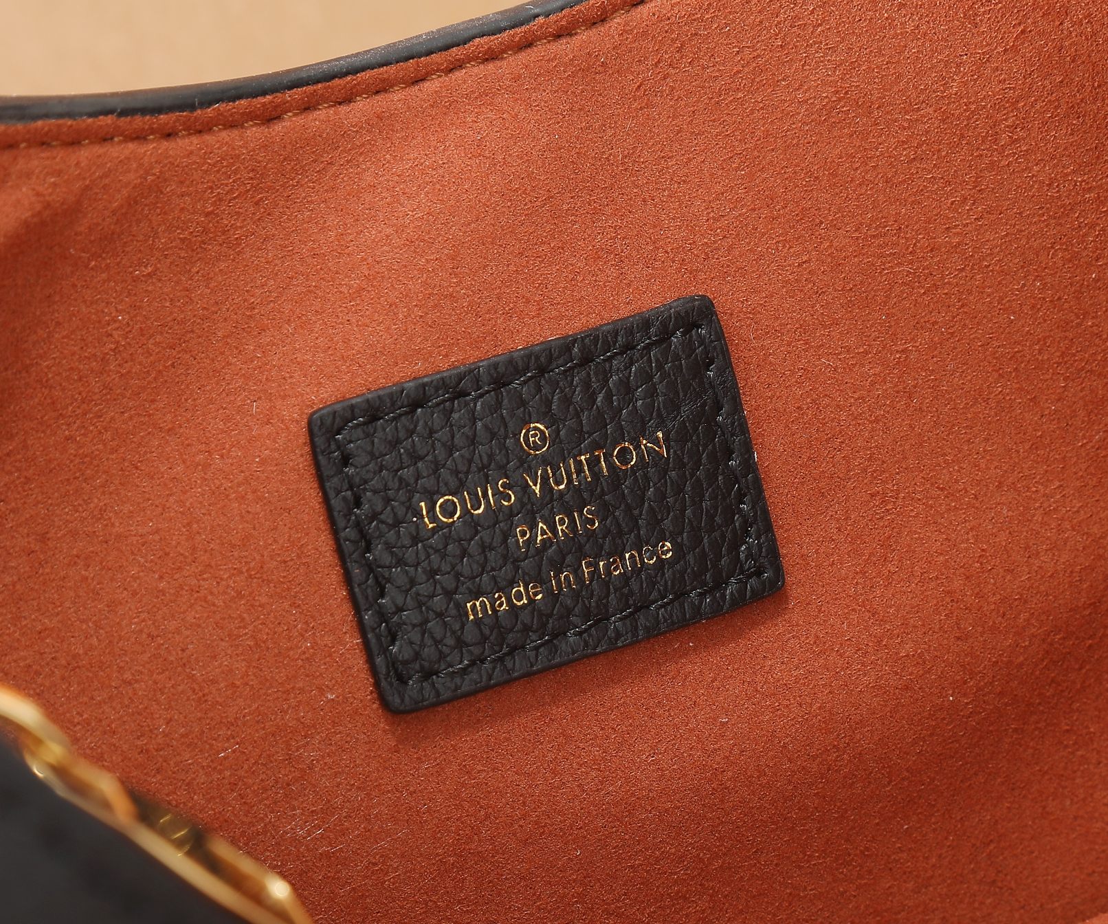 Low Key Shoulder Bag Black Grained Calfskin M24611