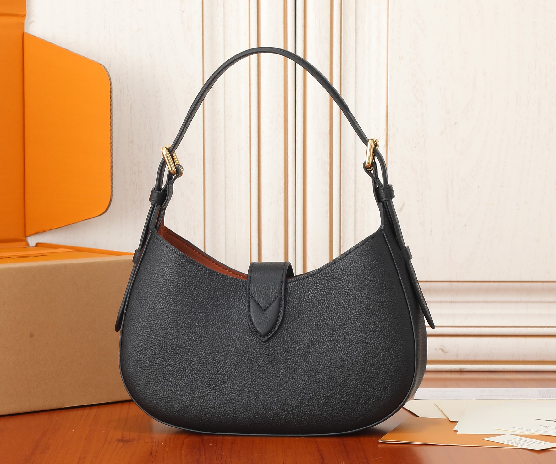 Low Key Shoulder Bag Black Grained Calfskin M24611