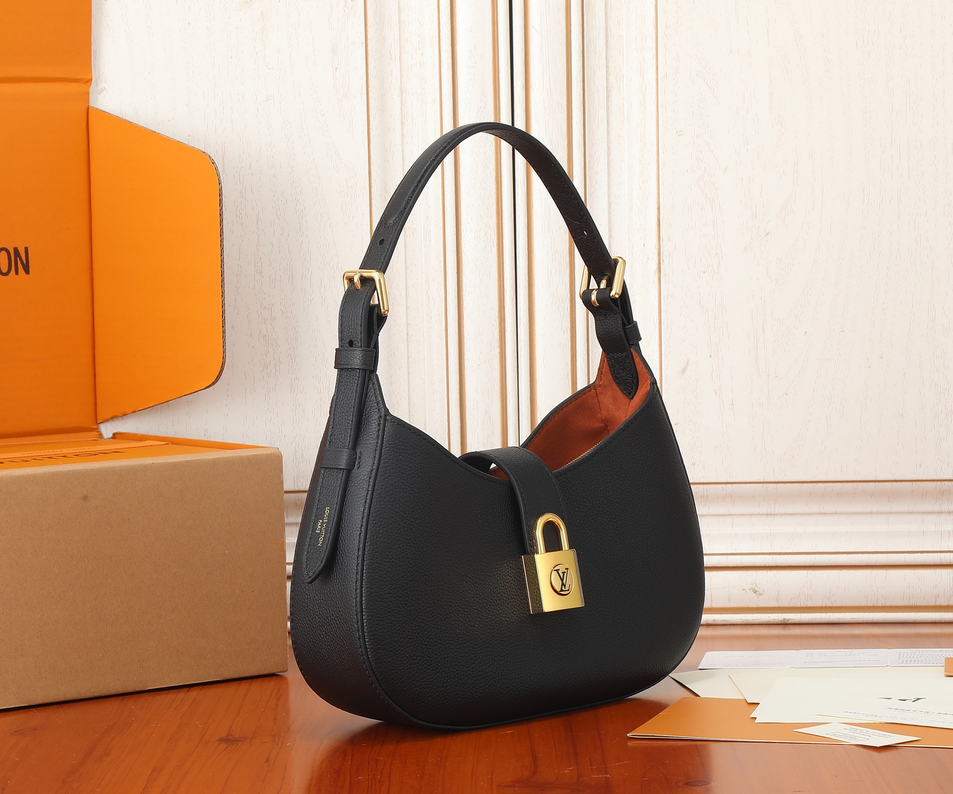 Low Key Shoulder Bag Black Grained Calfskin M24611