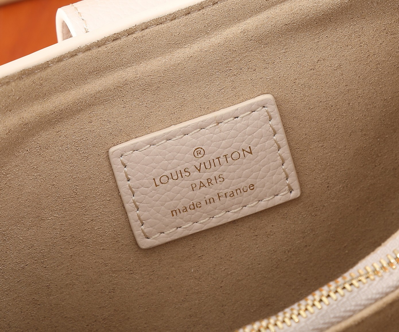 Low Key Shoulder Bag Limestone Gray Grained Calfskin M24611