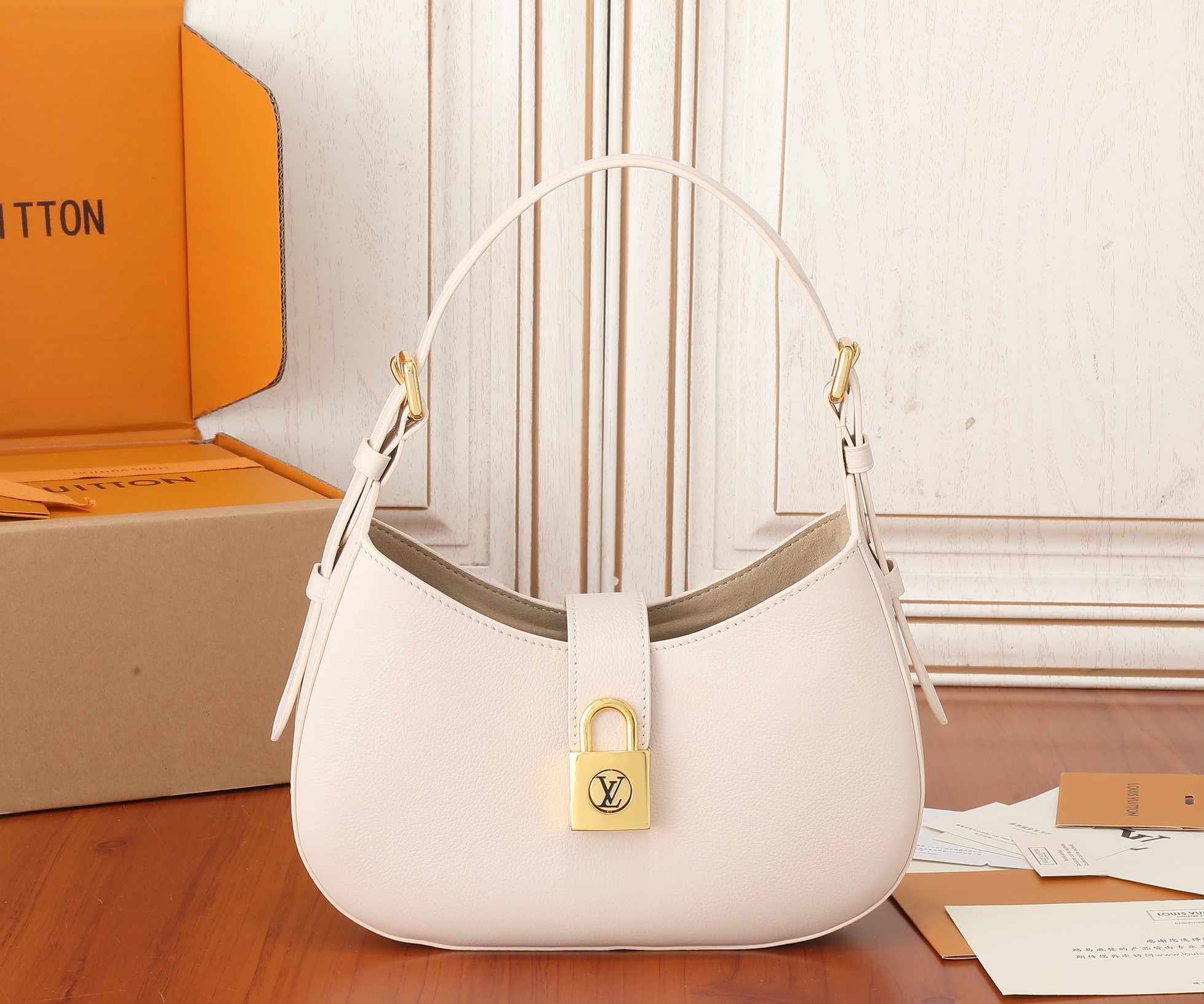 Low Key Shoulder Bag Limestone Gray Grained Calfskin M24611