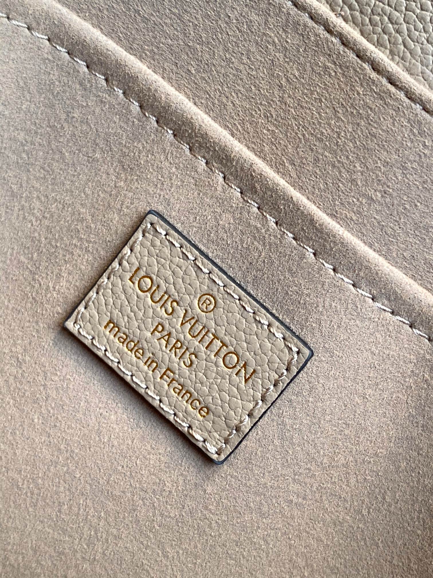 Madeleine Mm Handbag Bicolor Monogram Empreinte Leather Dove Gray / Crème Beige M46041