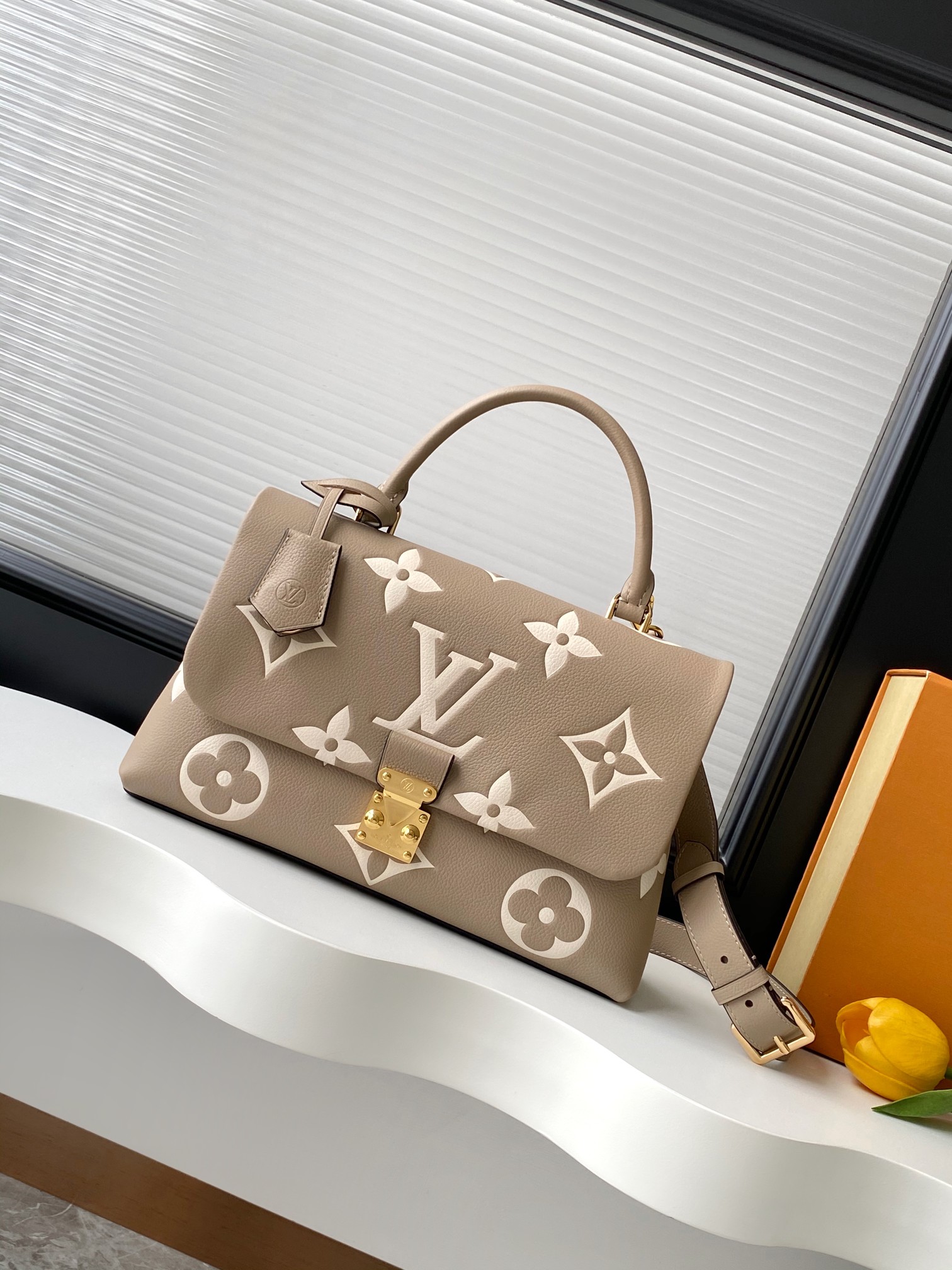 Madeleine Mm Handbag Bicolor Monogram Empreinte Leather Dove Gray / Crème Beige M46041
