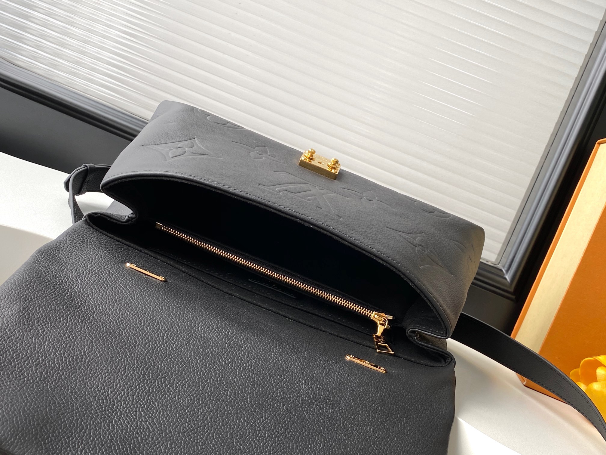 Madeleine Mm Handbag Monogram Empreinte Leather Black M45976