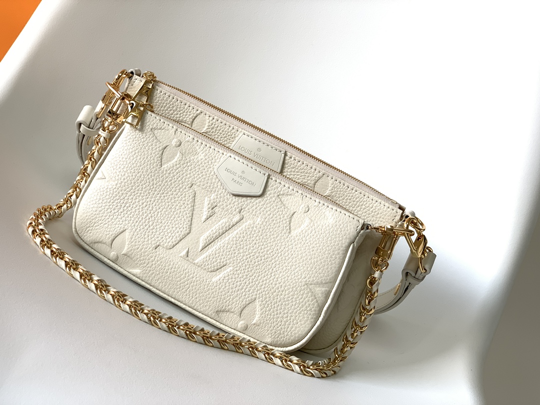 Multi Pochette Accessoires Monogram Empreinte Leather Cream M46568
