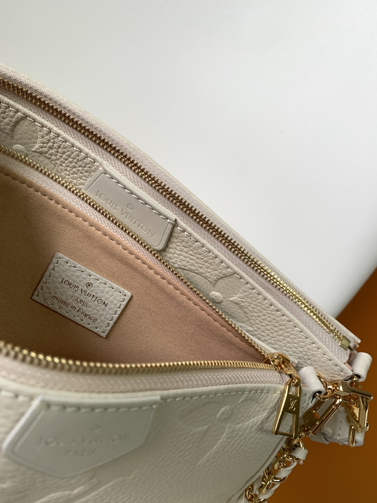 Multi Pochette Accessoires Monogram Empreinte Leather Cream M46568