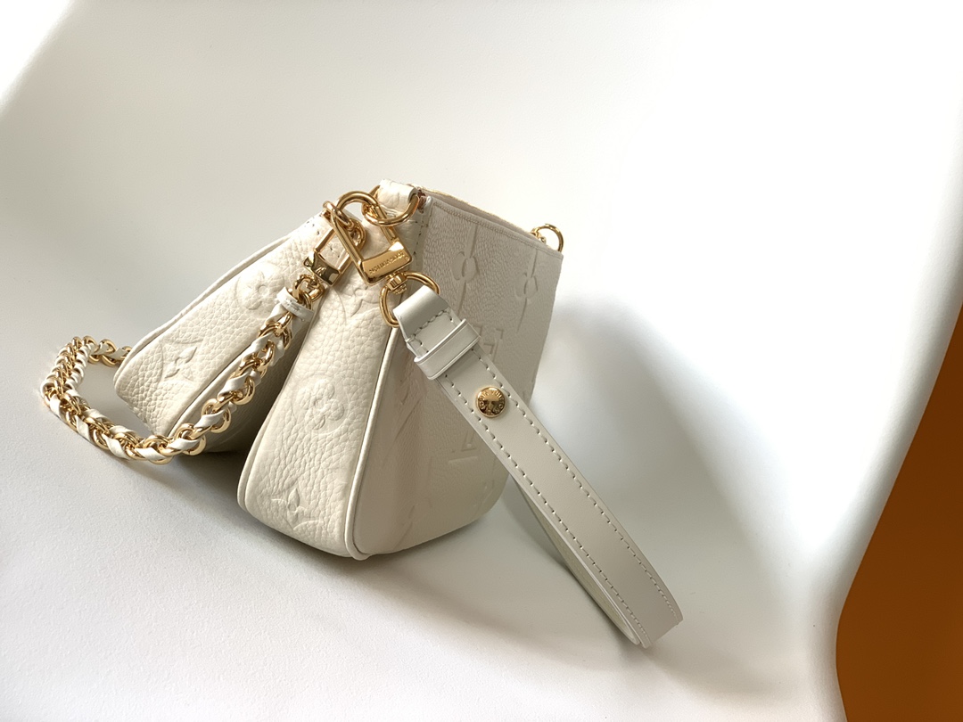 Multi Pochette Accessoires Monogram Empreinte Leather Cream M46568