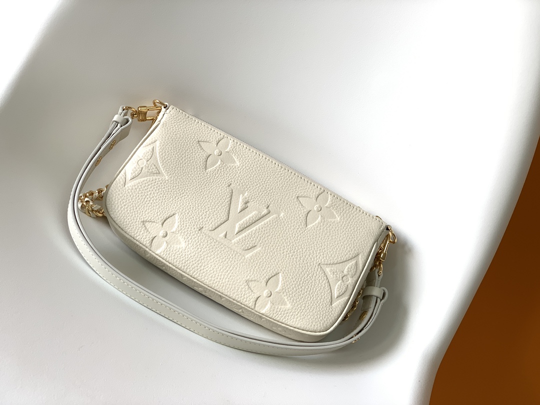 Multi Pochette Accessoires Monogram Empreinte Leather Cream M46568
