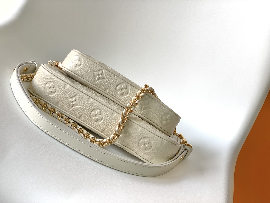 Multi Pochette Accessoires Monogram Empreinte Leather Cream M46568