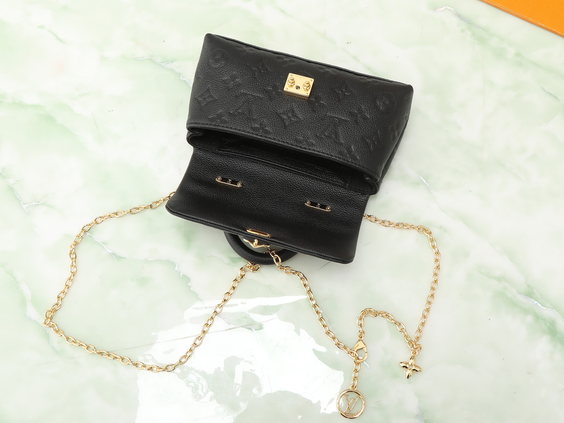 Nano Madeleine Handbag Monogram Empreinte Leather Black M12144