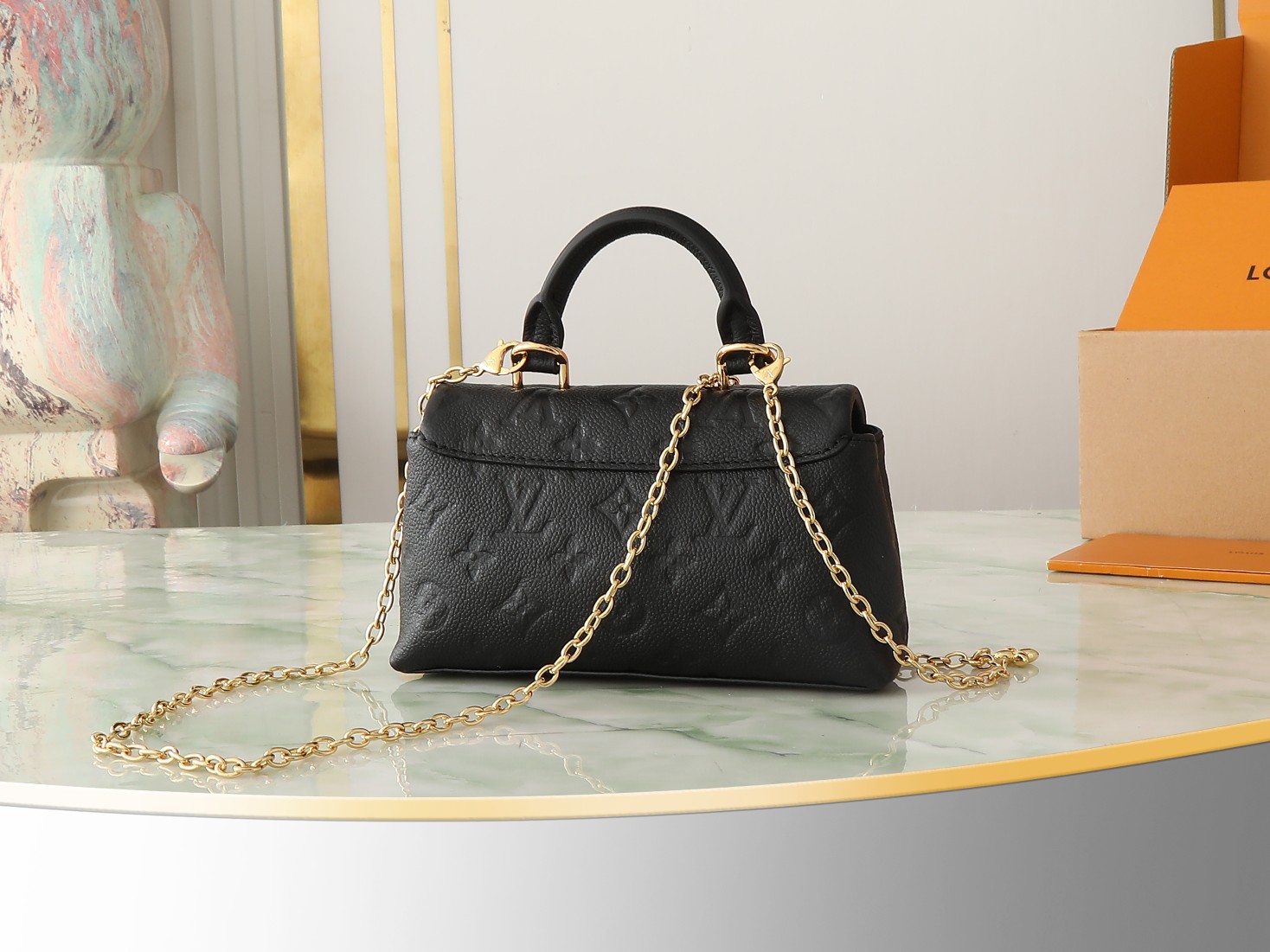 Nano Madeleine Handbag Monogram Empreinte Leather Black M12144