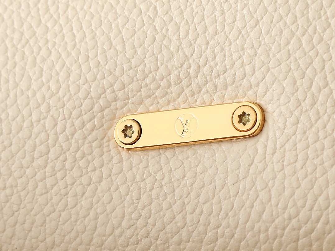 Nano Madeleine Handbag Monogram Empreinte Leather Cream M12145