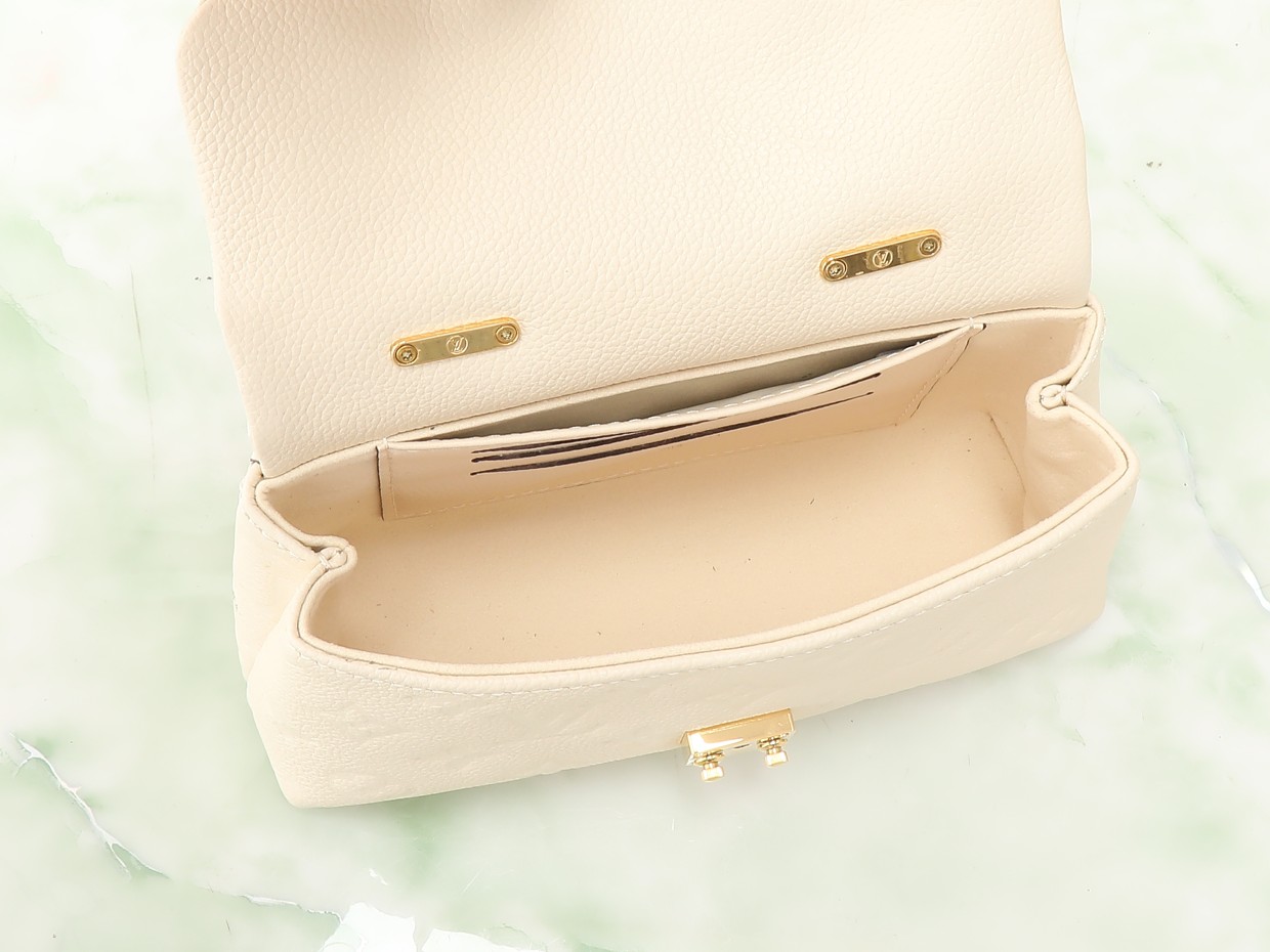 Nano Madeleine Handbag Monogram Empreinte Leather Cream M12145