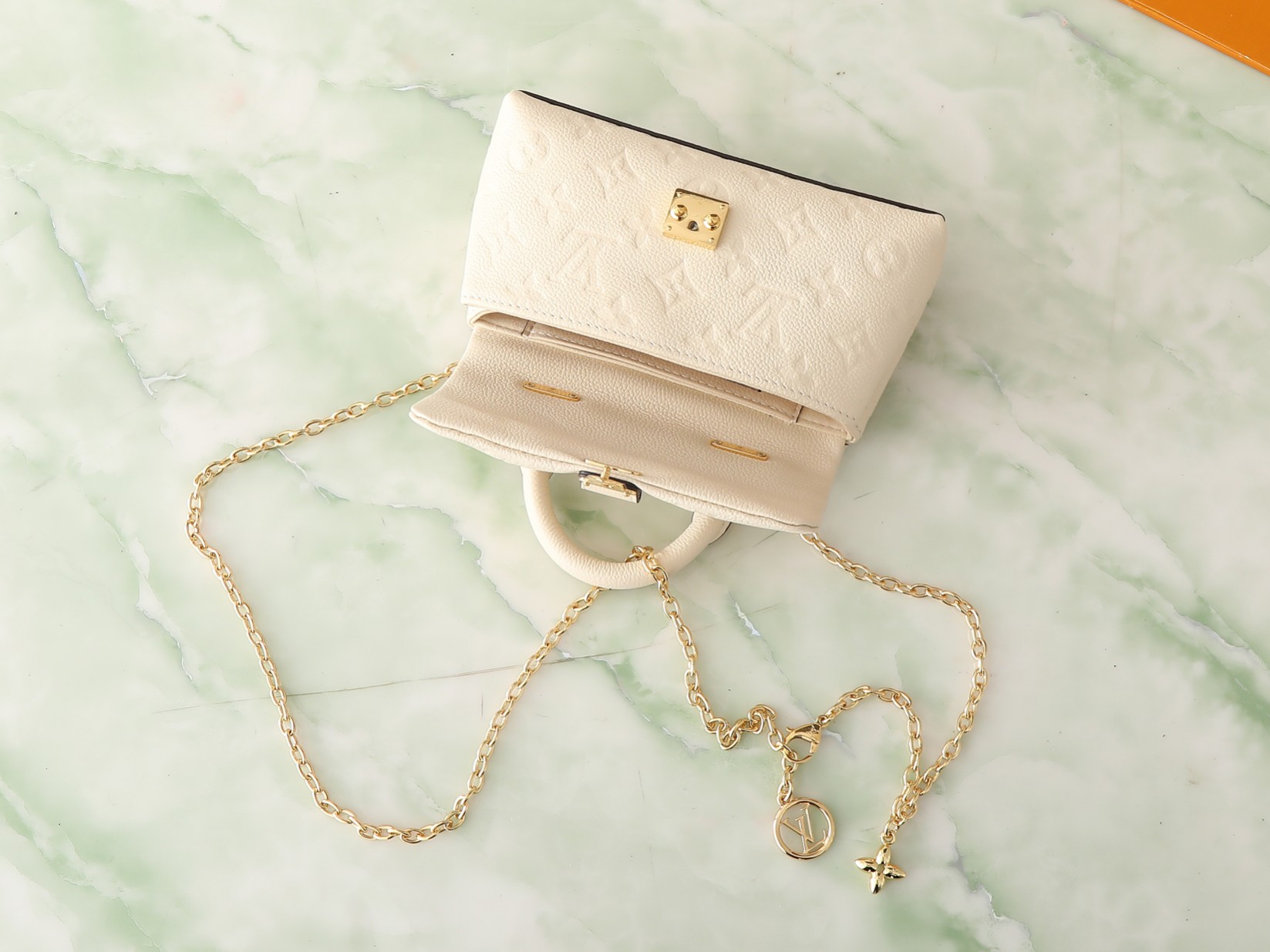 Nano Madeleine Handbag Monogram Empreinte Leather Cream M12145