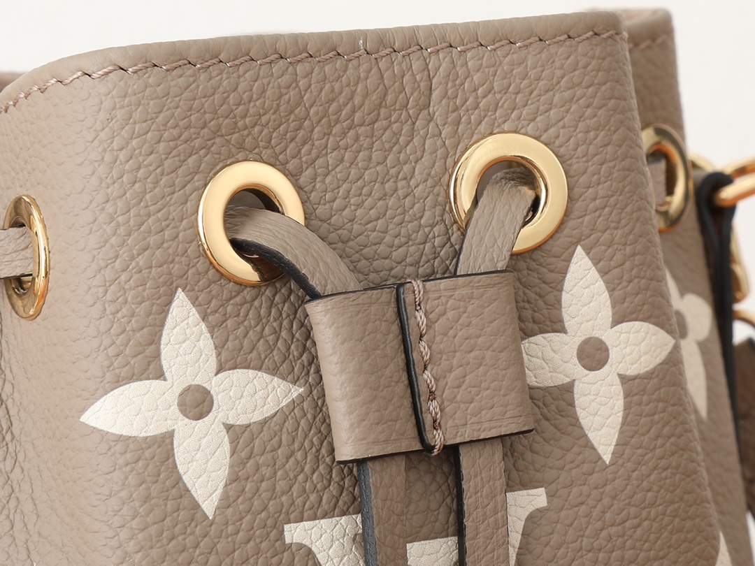 Nano Noé Bucket Bag Bicolor Monogram Empreinte Leather Tourterelle Gray / Cream M46291