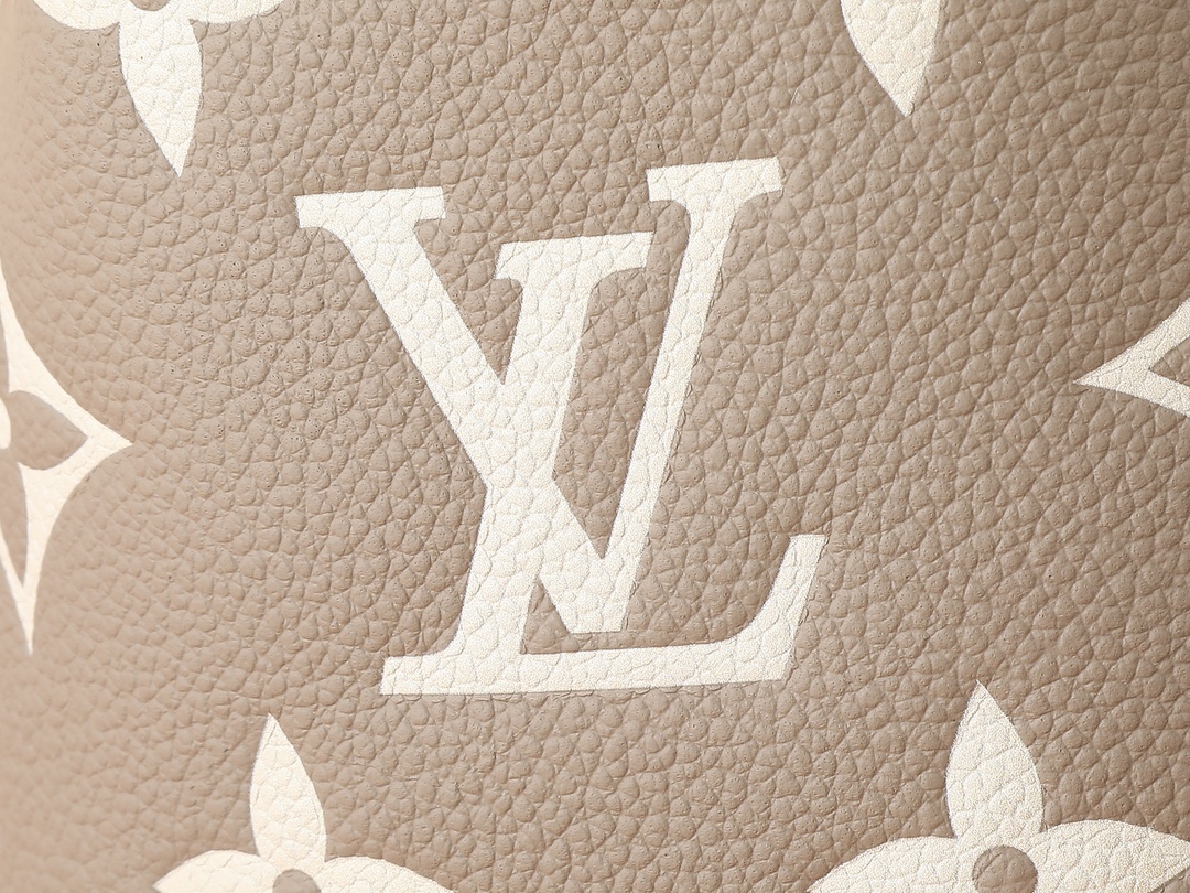 Nano Noé Bucket Bag Bicolor Monogram Empreinte Leather Tourterelle Gray / Cream M46291