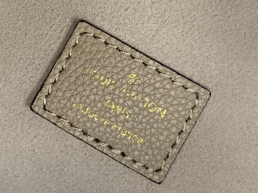 Néonoé Mm Handbags Bicolor Monogram Empreinte Leather Dove/Cream M45555