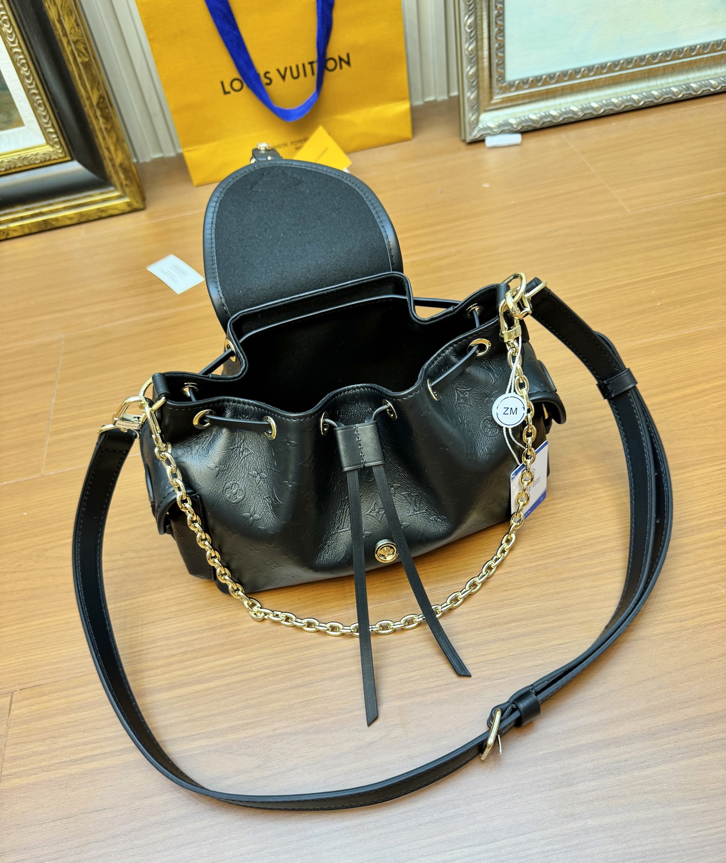 Odyssée Handbags Black Calfskin Leather M25554