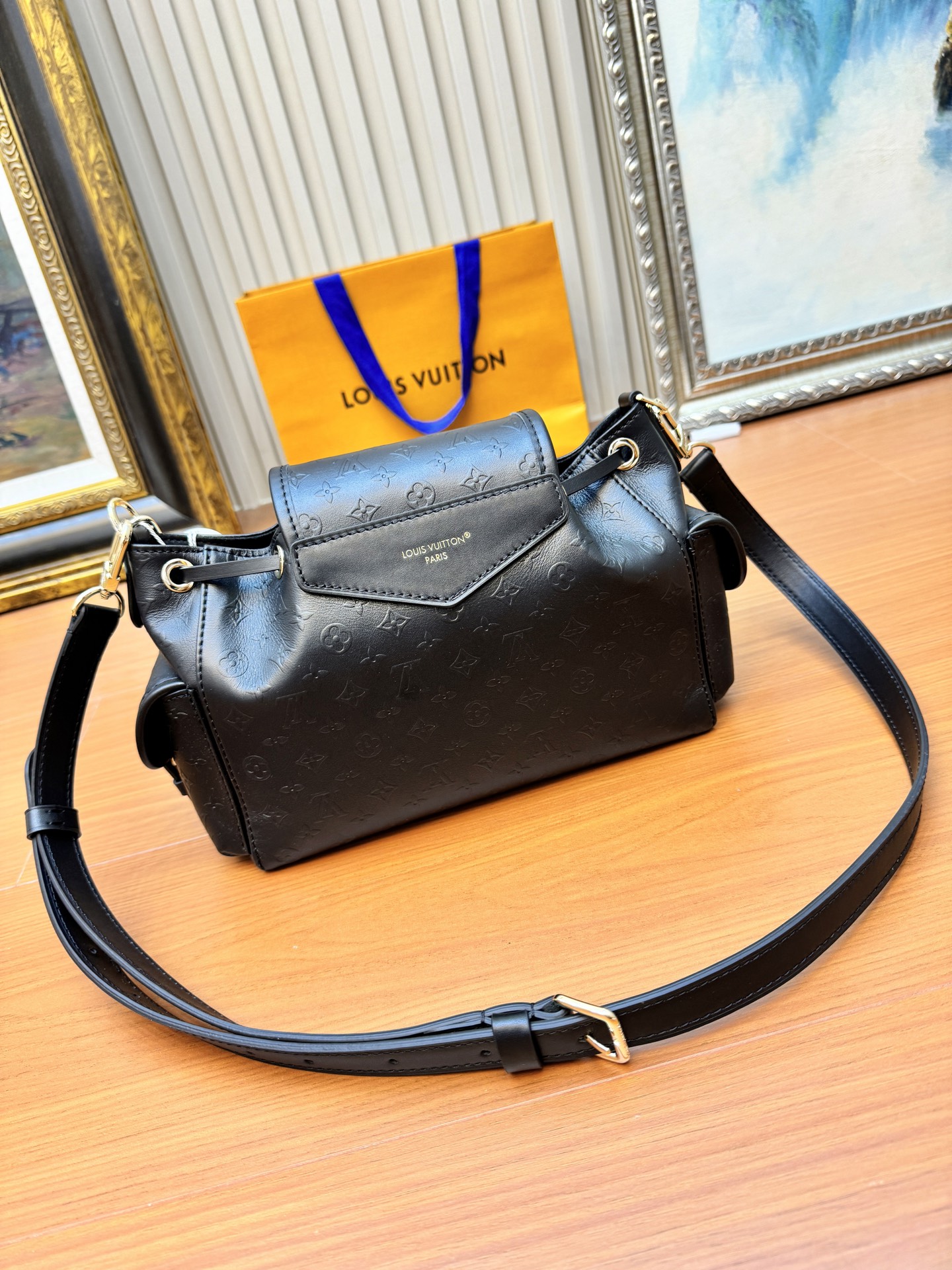 Odyssée Handbags Black Calfskin Leather M25554