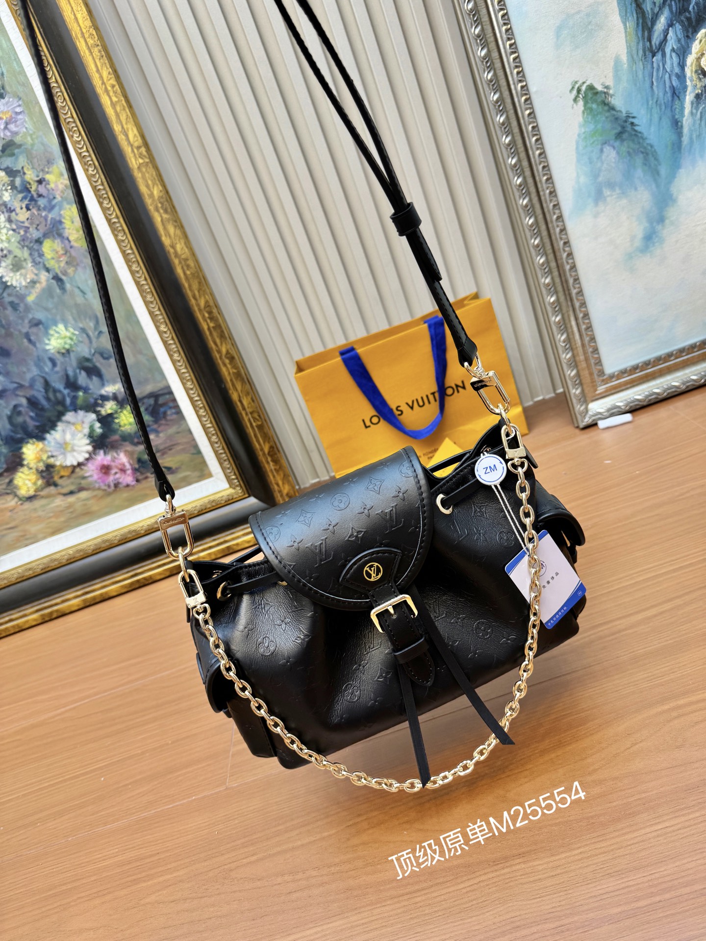 Odyssée Handbags Black Calfskin Leather M25554