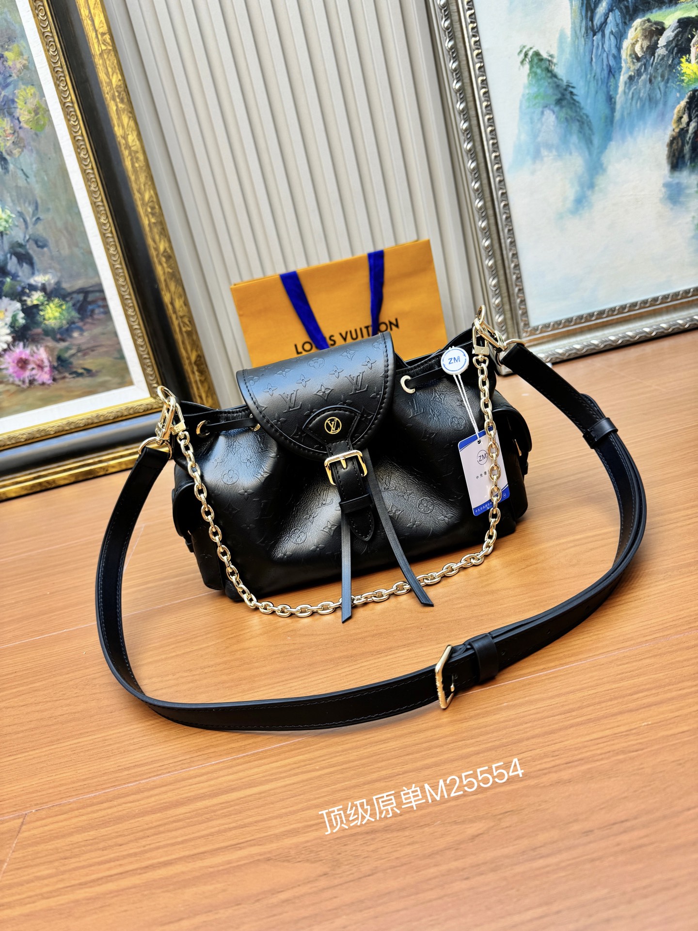 Odyssée Handbags Black Calfskin Leather M25554