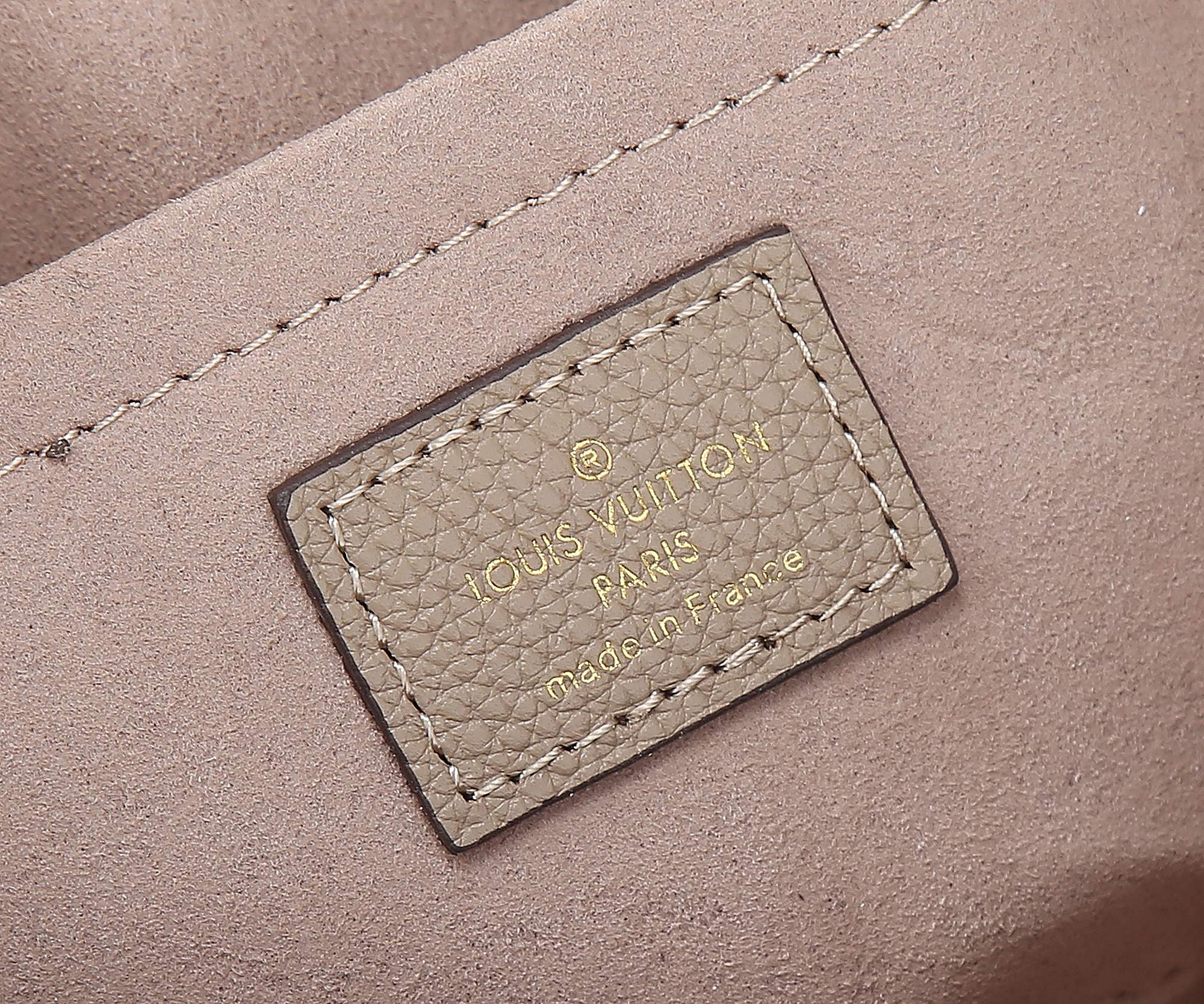 Onthego East West Chain Bicolor Monogram Empreinte Leather Dove/Cream M23641